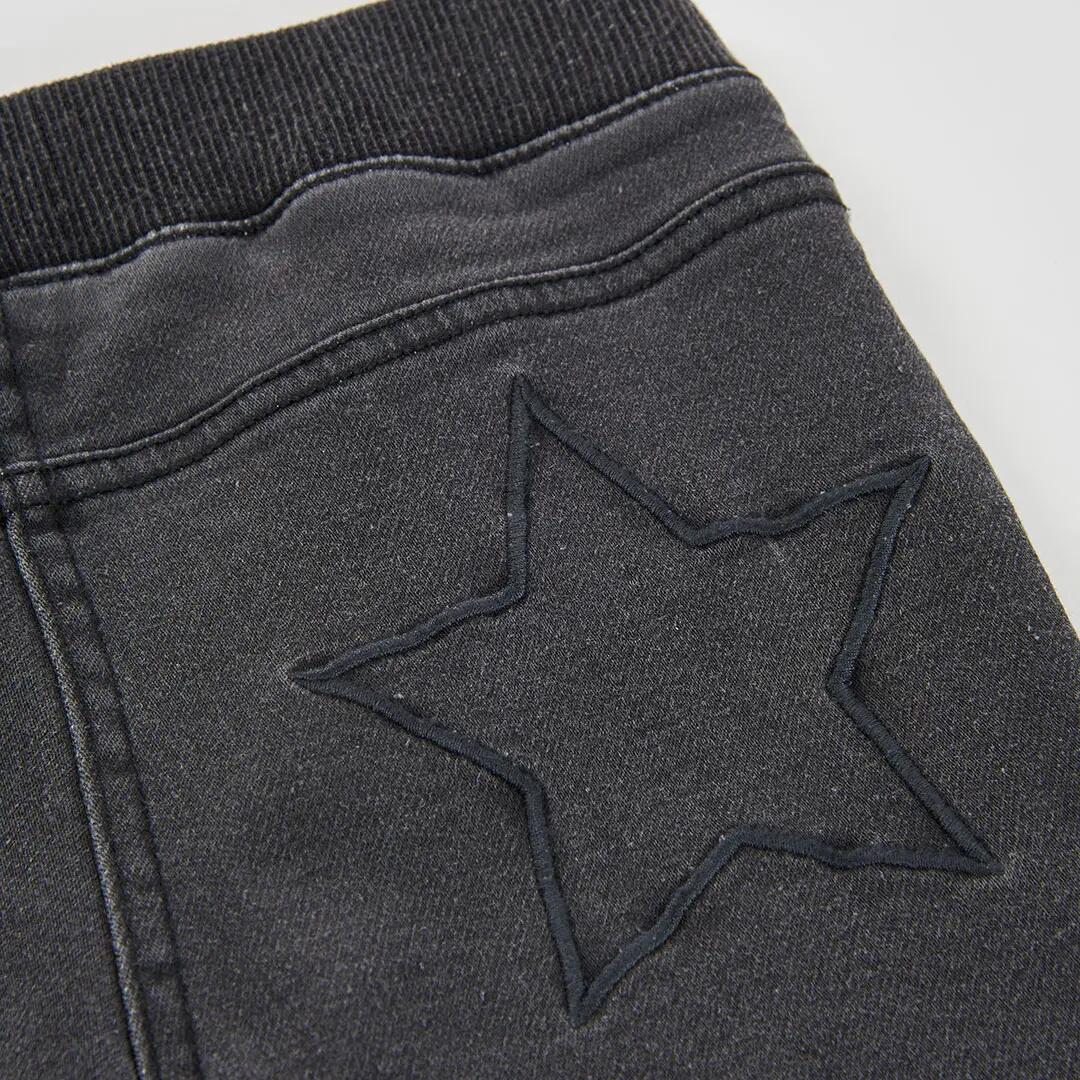 Pantalón denim niña negro con estrellas 4/4