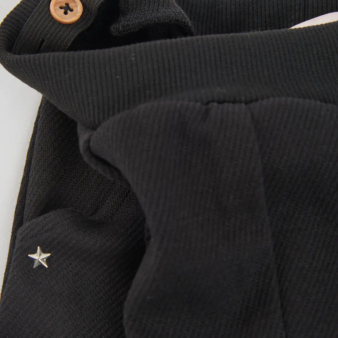 Pantalón punto niña negro con estrellas 4/4