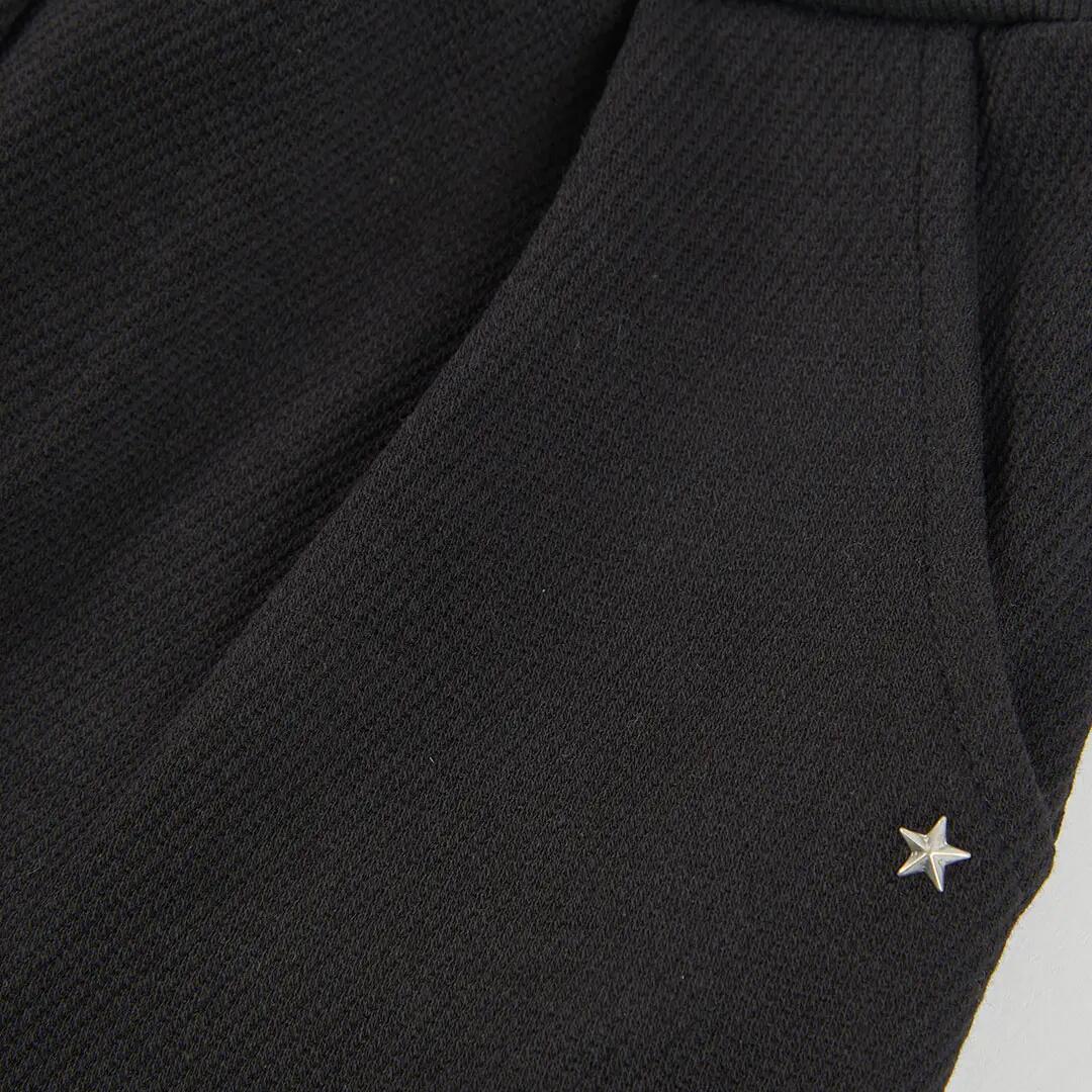 Pantalón punto niña negro con estrellas 3/4