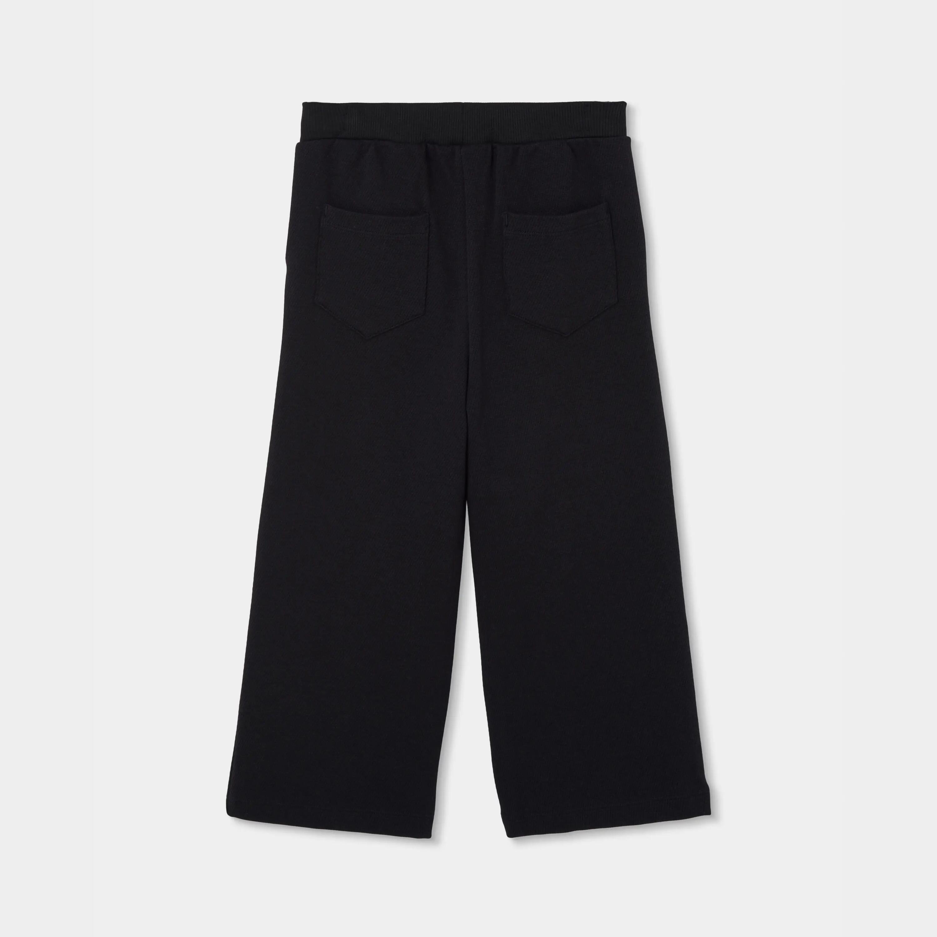 Pantalón punto niña negro con estrellas 2/4