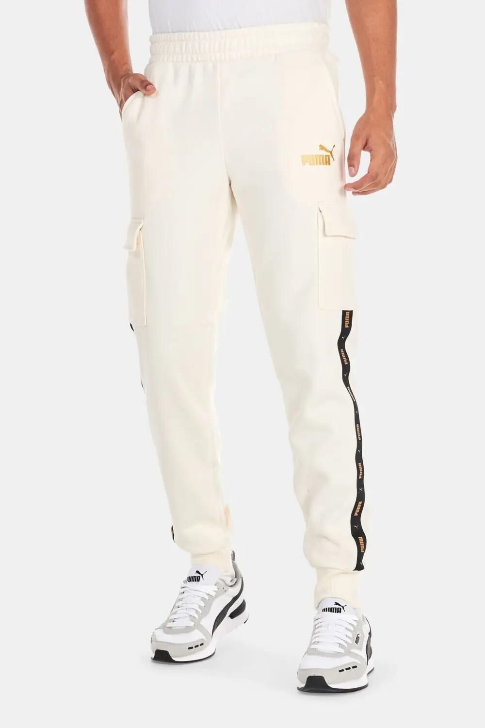 Pantalones cargo dorados Ess+ Tape 1/2
