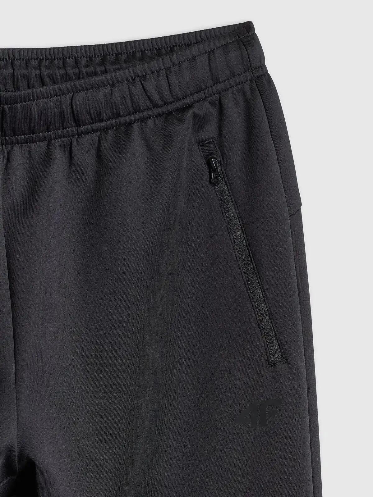 Spodnie treningowe z wykończeniem szybkoschnącym męskie czarne 4F Czarny XL 5/6