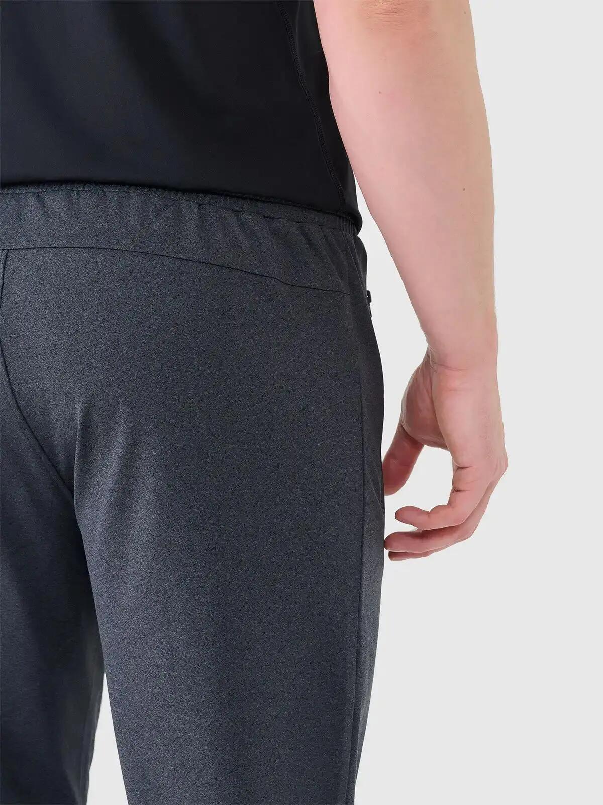 Spodnie treningowe z jednostronnie drapanej dzianiny męskie szare 4F Szary 3XL 6/6