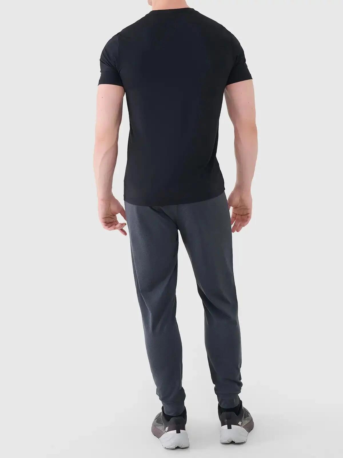 Spodnie treningowe z jednostronnie drapanej dzianiny męskie szare 4F Szary 3XL 3/6