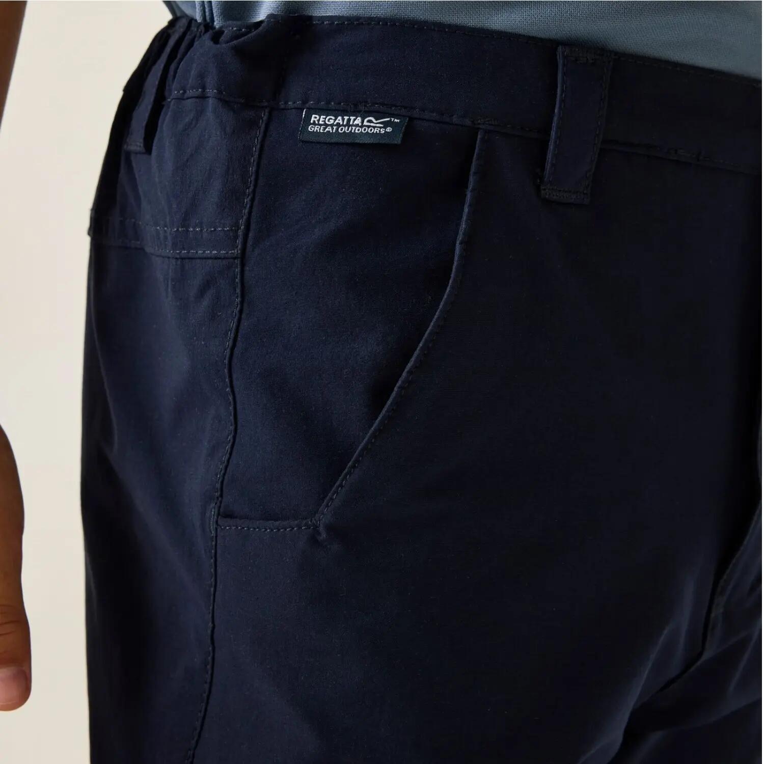 Pantalón senderismo niño múltiples bolsillos Regatta Highton Stretch Zip Off 5/7