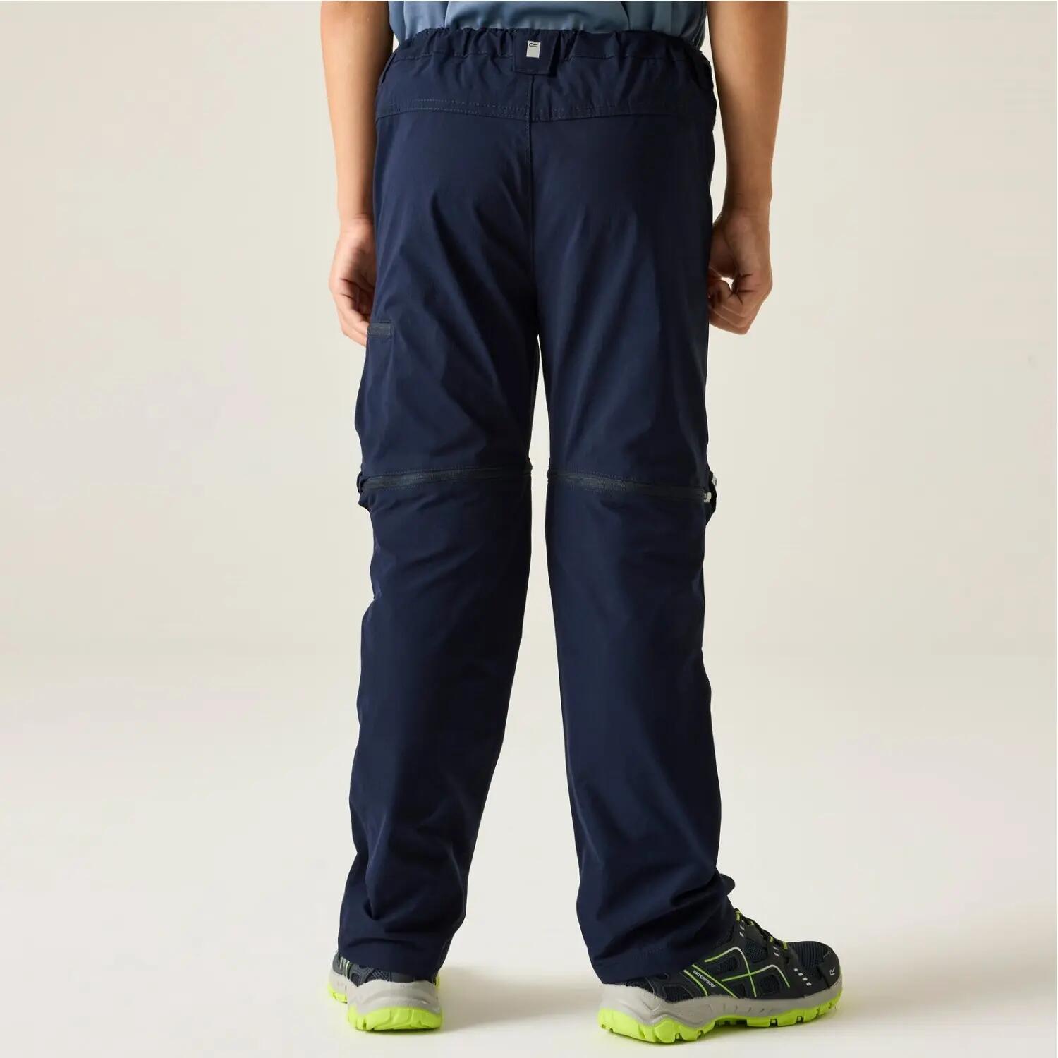 Pantalón senderismo niño múltiples bolsillos Regatta Highton Stretch Zip Off 3/7