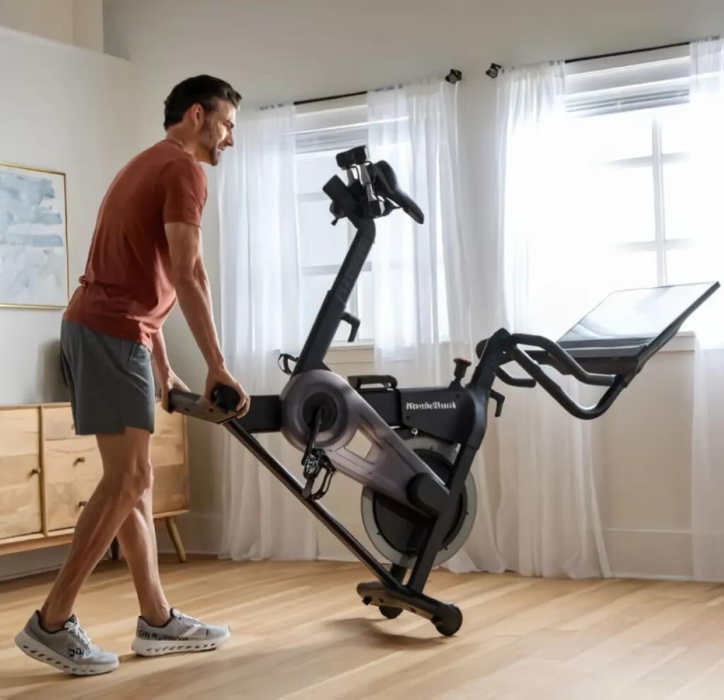 Vélo d'appartement 24 Studio Bike / 24 Niveaux de résistances + deux haltères 9/10