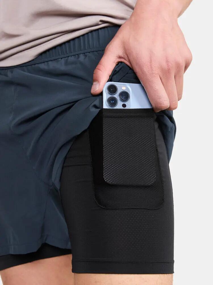 craft ADV Essence 2-in-1 Stretch Shorts M — calções de treino com tight interior 6/7
