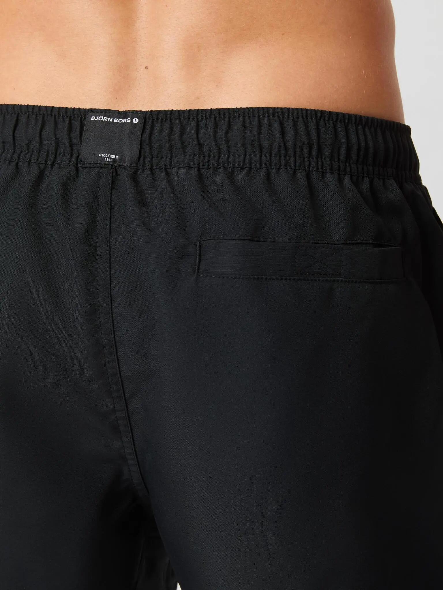 bjorn_borg BORG SOLID SWIM SHORTS em poliéster reciclado - BLACK BEAUTY 4/4