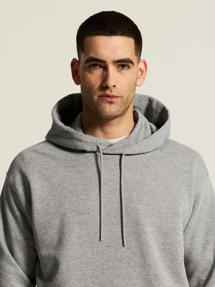 craft Frequent Hoodie M — 100% algodão biológico, corte relaxed 7/7
