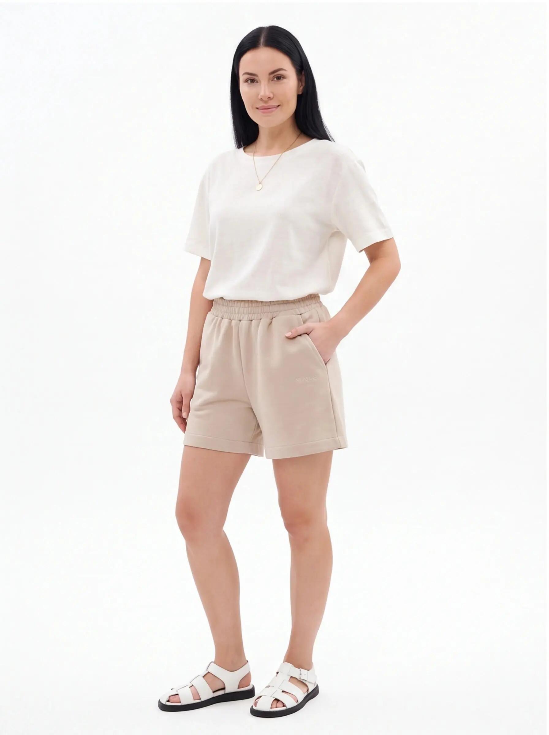 Shorts de sport pour femmes UNLEASH WINGS BEIGE 2/3