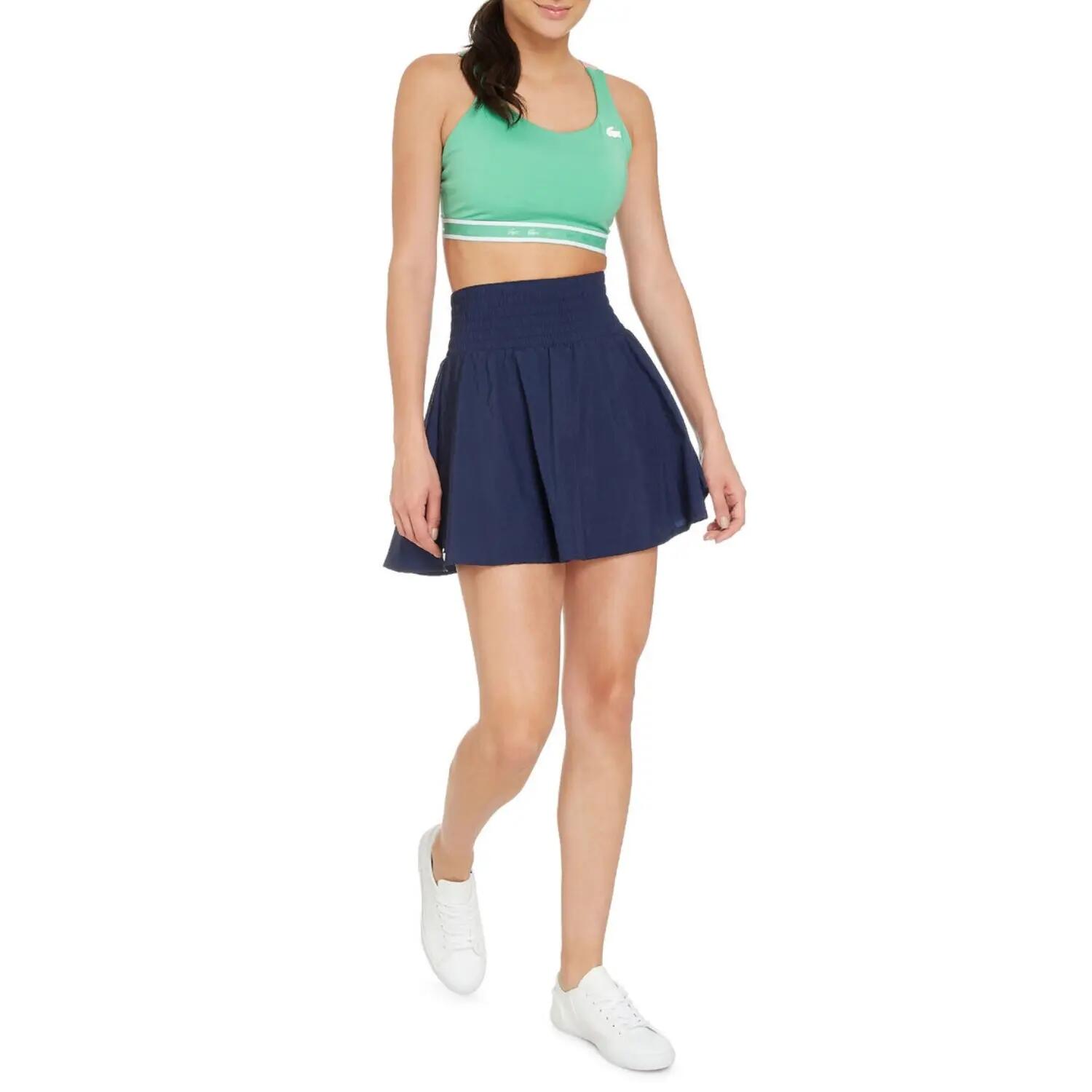Top sportivo Lacoste Sport verde aderente con spalline incrociate 3/5