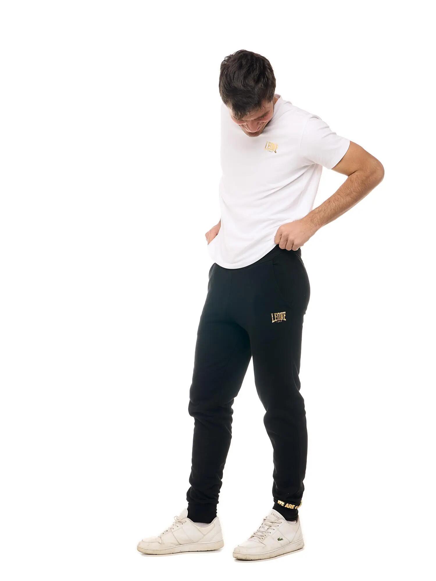 Pantalones deportivos Leone New Gold para hombre con puños 3/6