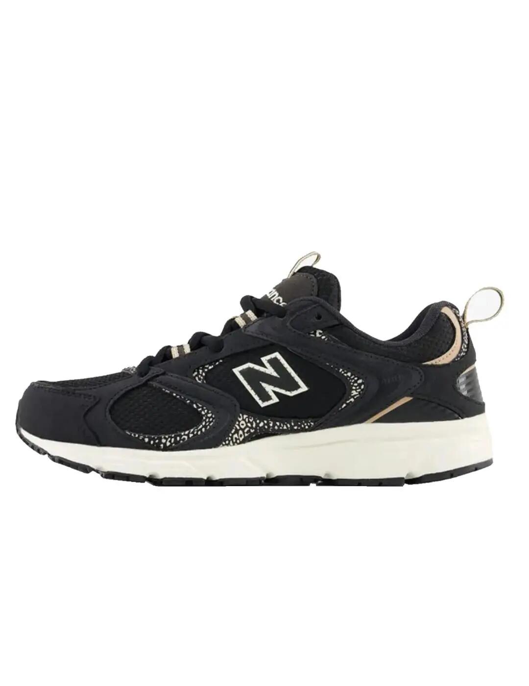 Chaussures de femme New Balance noires. 2/5