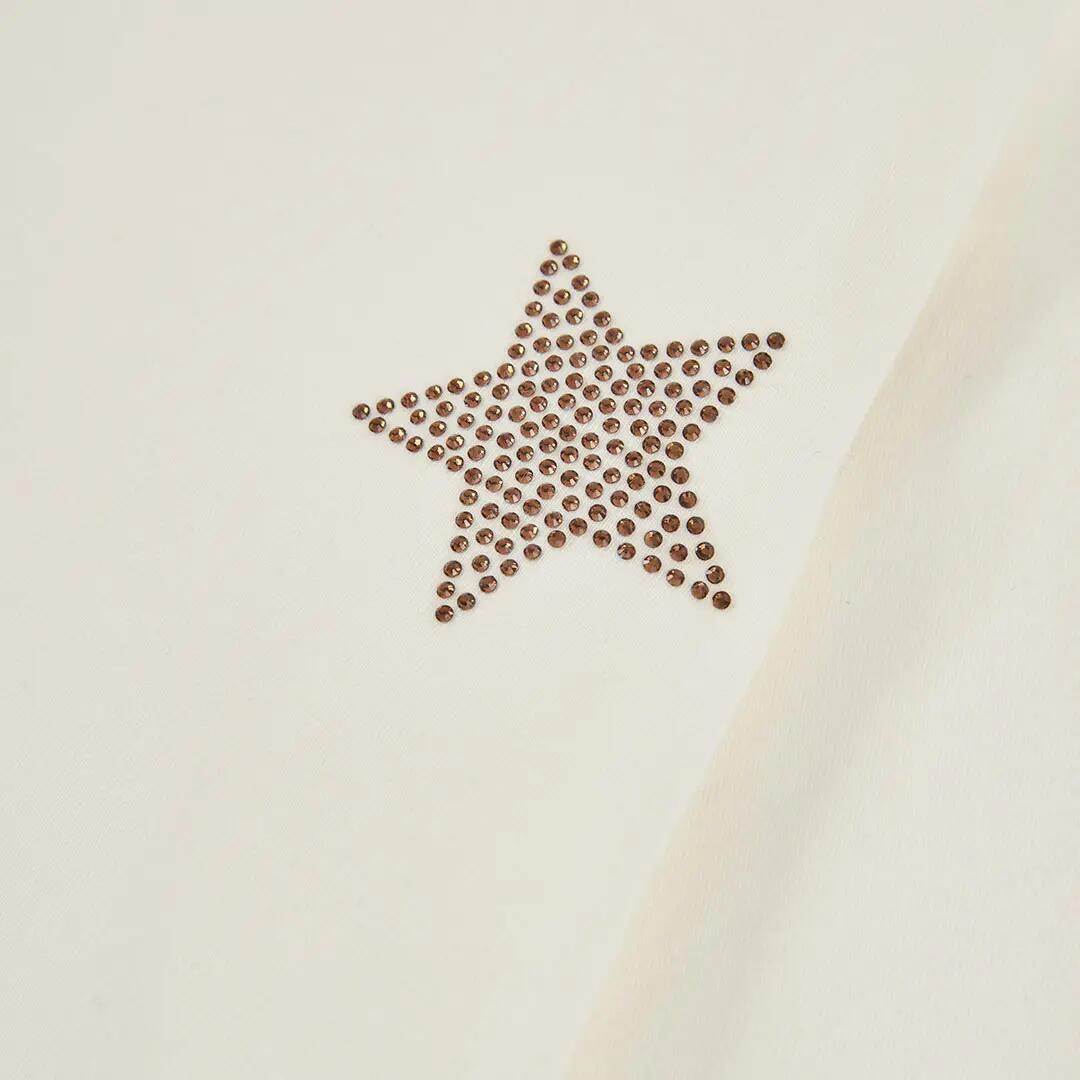 Camiseta punto niña blanca con estrellas 3/4