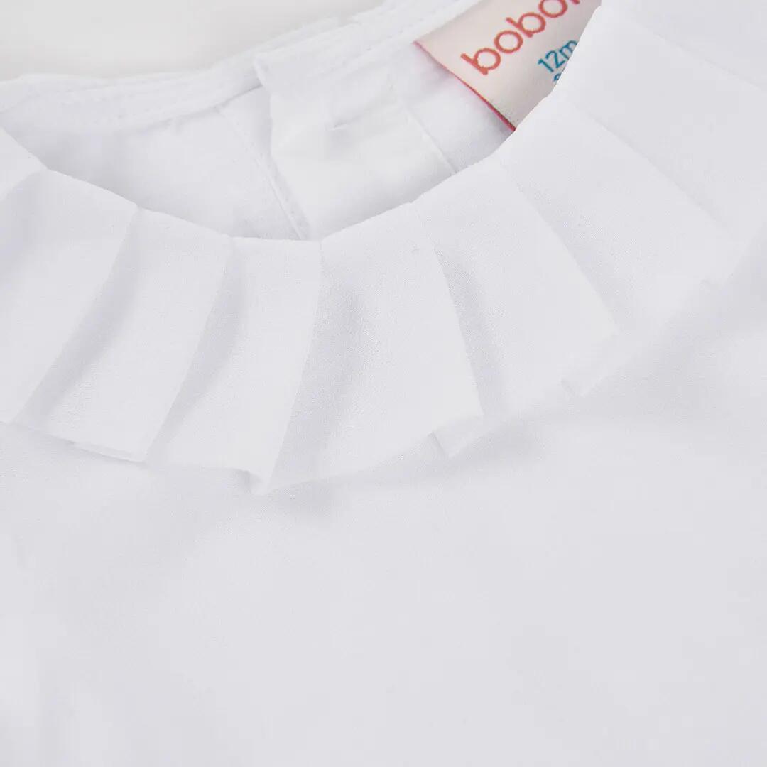 Blusa blanca con cuello volante 4/5