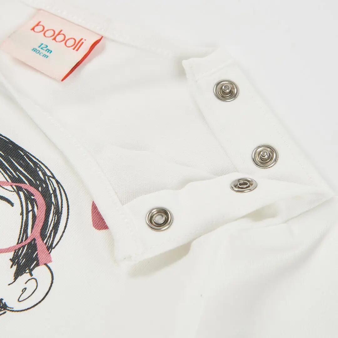 Camiseta punto niña blanca estampado niña con flores 3/4