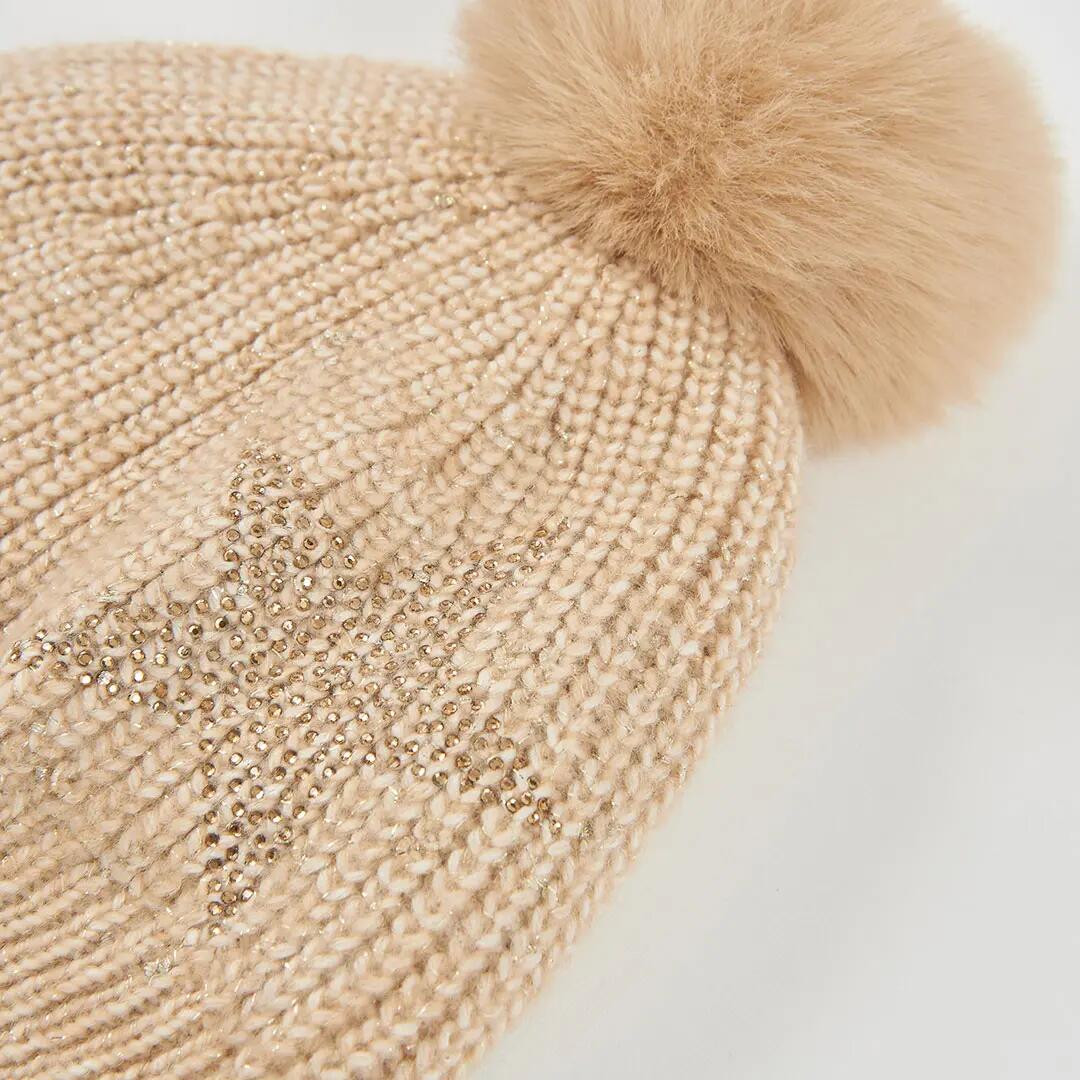 Gorro amarillo con estrella y pompón 2/3