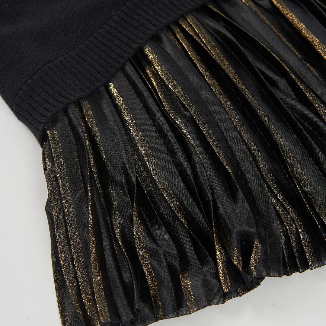 Vestido combinado negro con falda plisada dorada 4/4