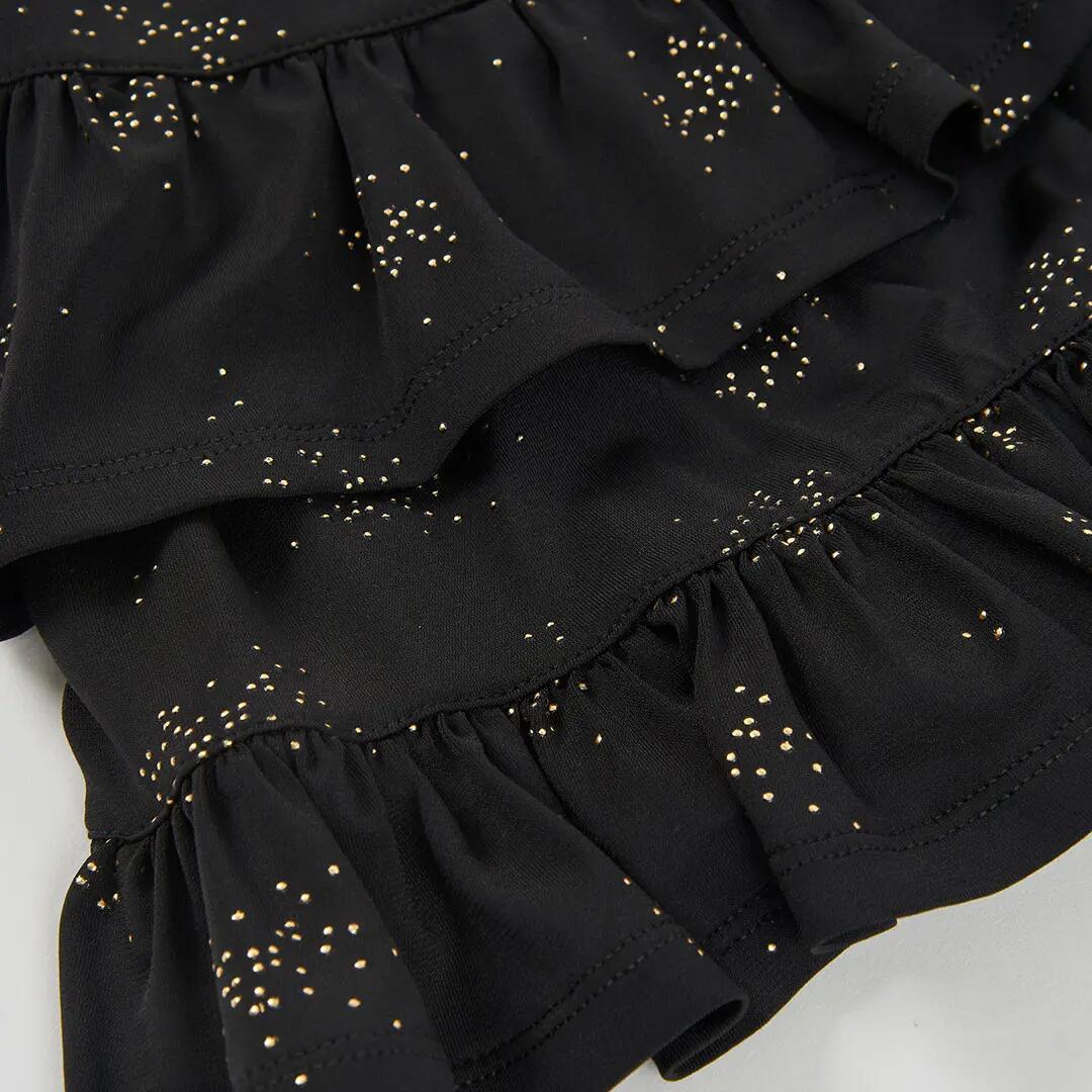 Falda punto negra estampada con estrellas y volantes 4/4