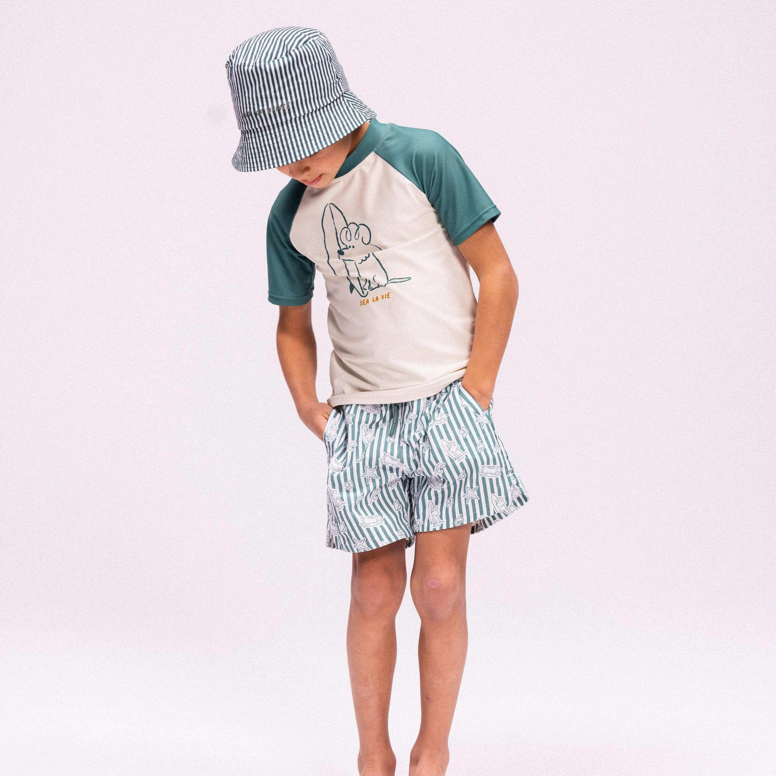 Gorro con protección UV verde estampado de surf 1 a 2 años reversible 5/6
