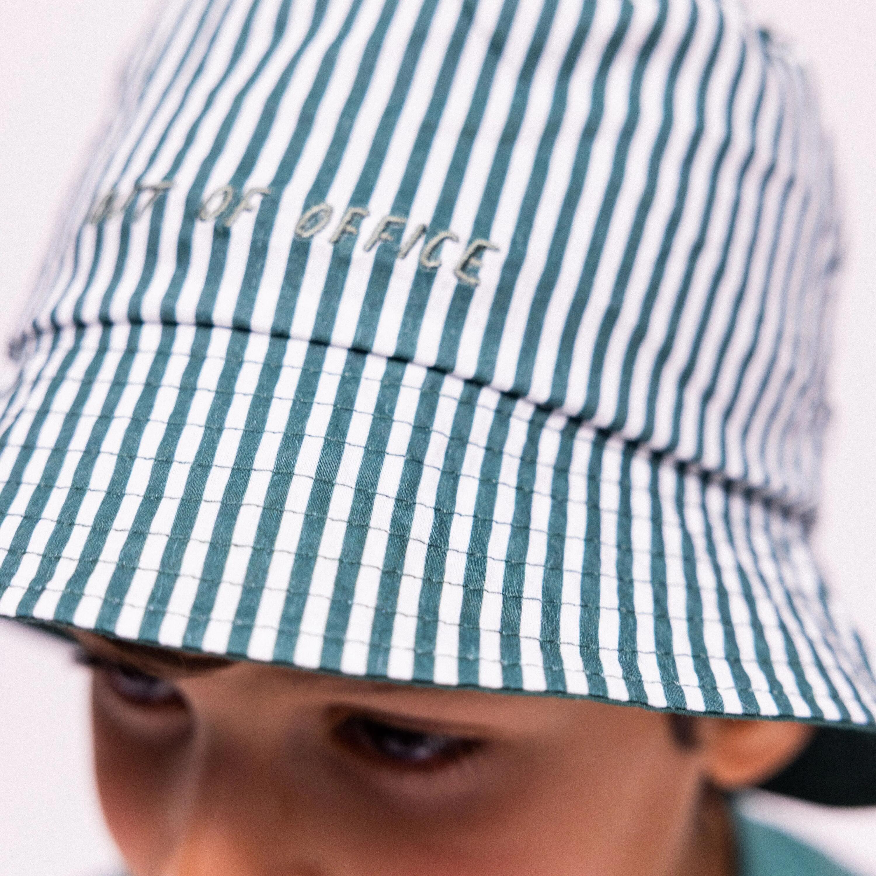 Gorro con protección UV verde estampado de surf 1 a 2 años reversible 4/6