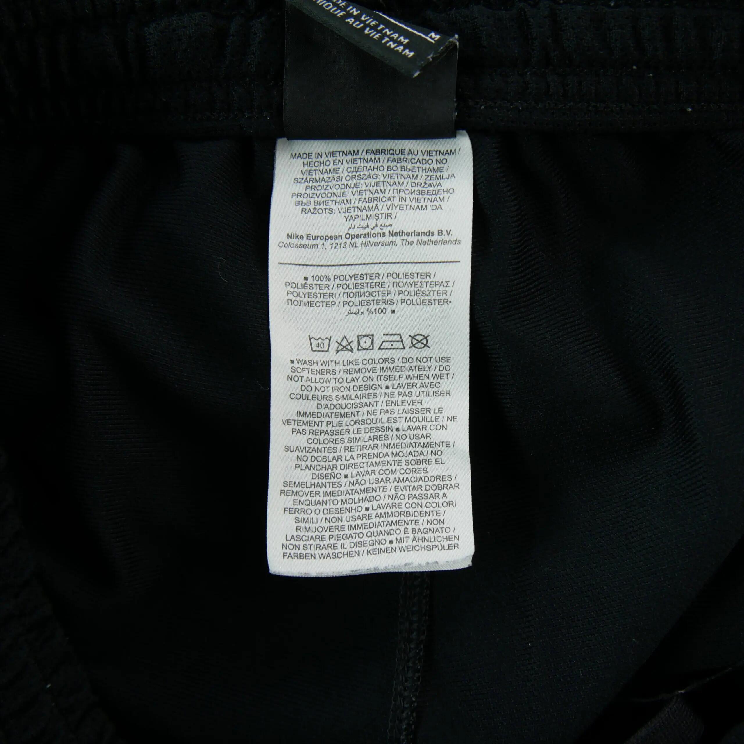 Tweedehands - Nike jogging heren Dri-FIT met roze strepen - Als nieuw 6/7