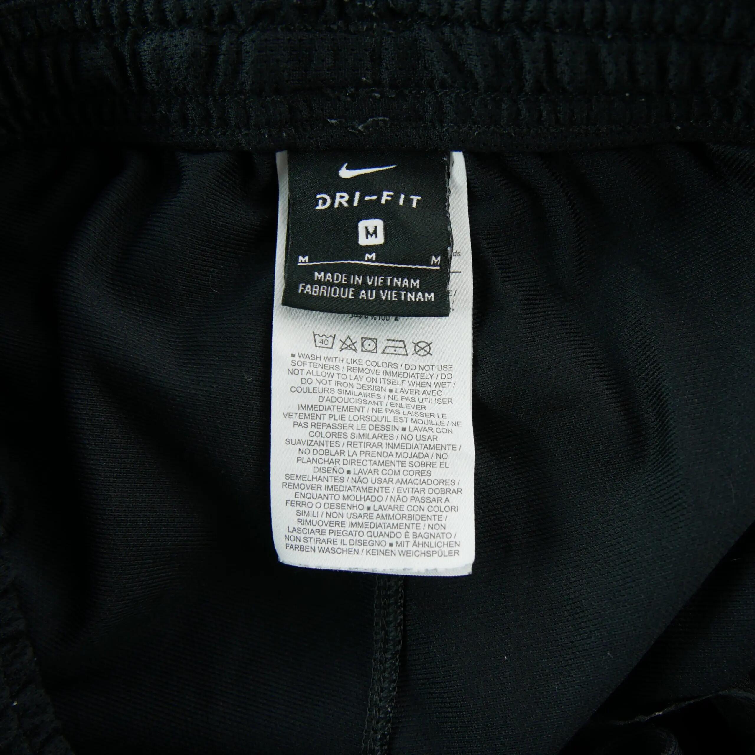 Tweedehands - Nike jogging heren Dri-FIT met roze strepen - Als nieuw 5/7