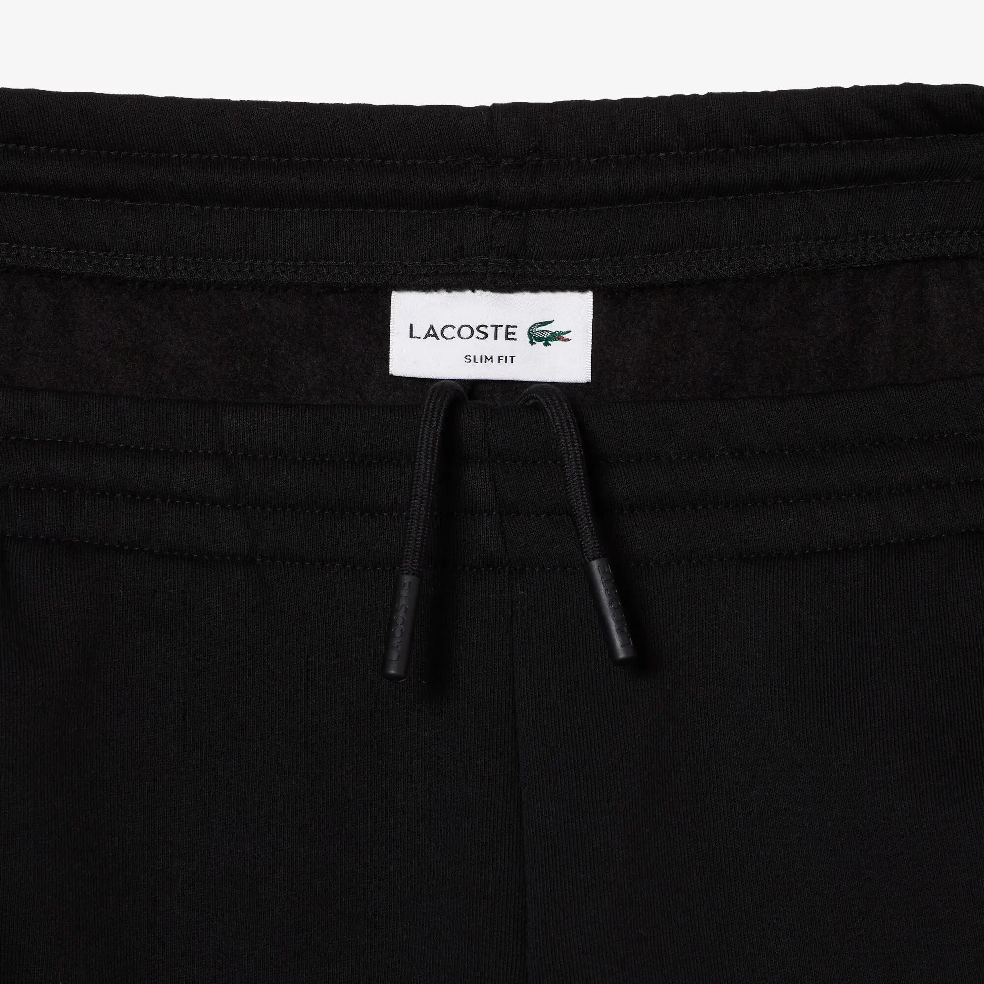 Spodnie dresowe bawełniane Lacoste 7/7