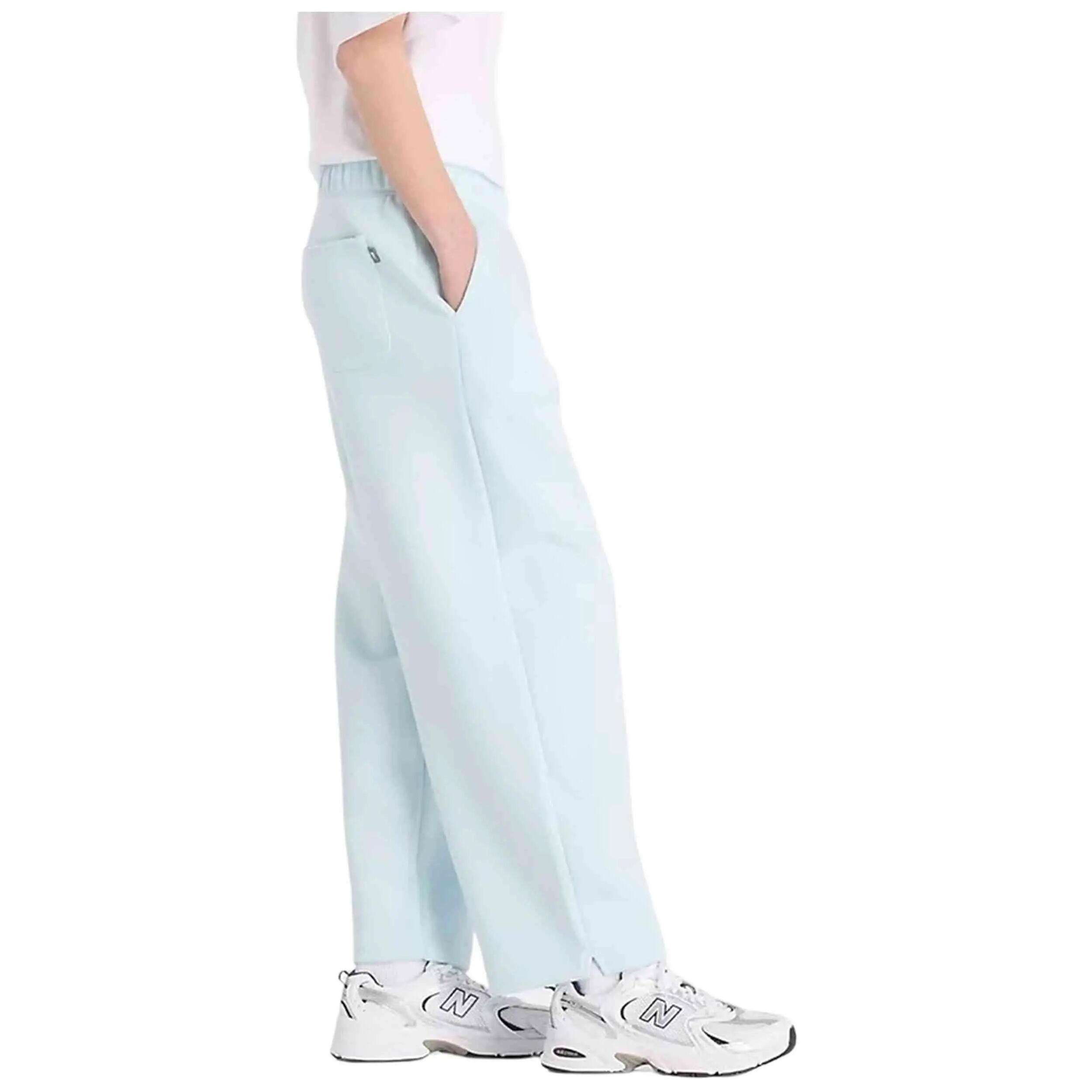Calças de fato de treino New balance modelo WP53505_BK para mulheres 3/4