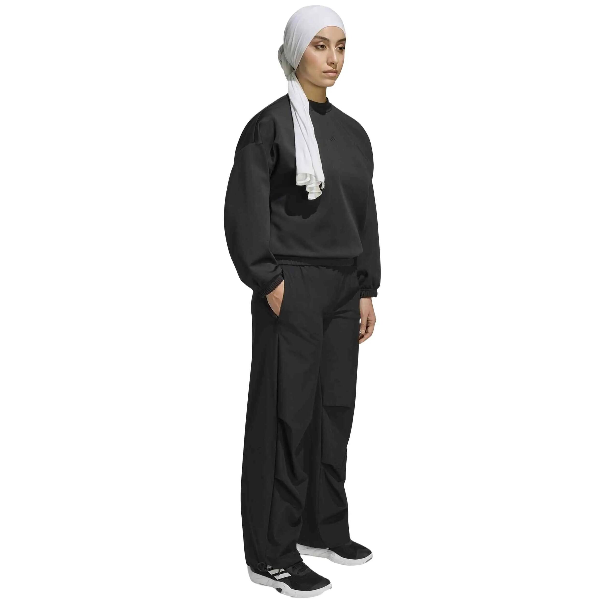 Felpa Adidas modello Sudadera adidas Essentials Yoga marrón negro muje per donne 2/5