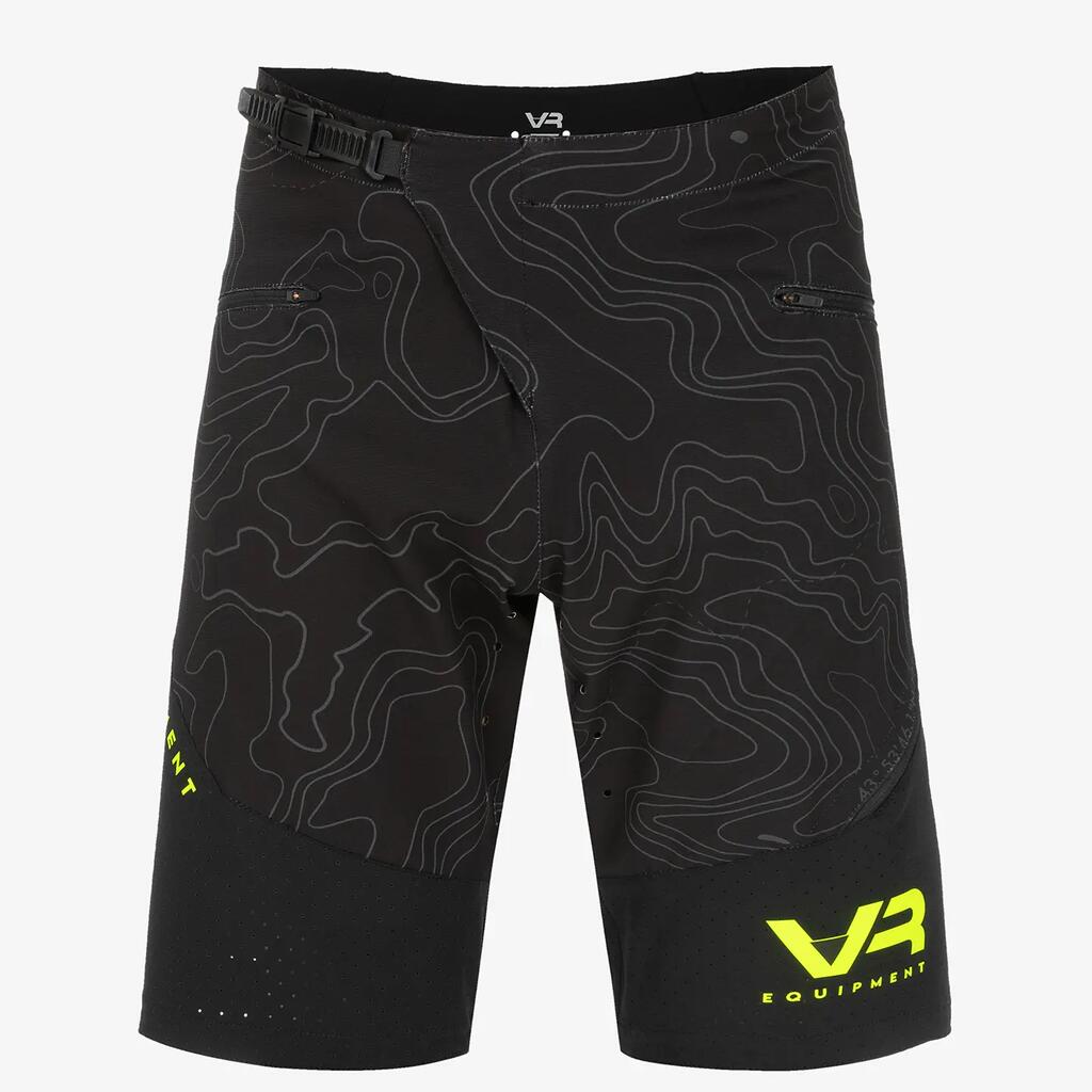 Men's motocross shorts, patterned, black with light green accents.