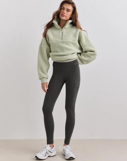 Damen Leggings Wärmend mit Taschen Dunkles Efeugrün