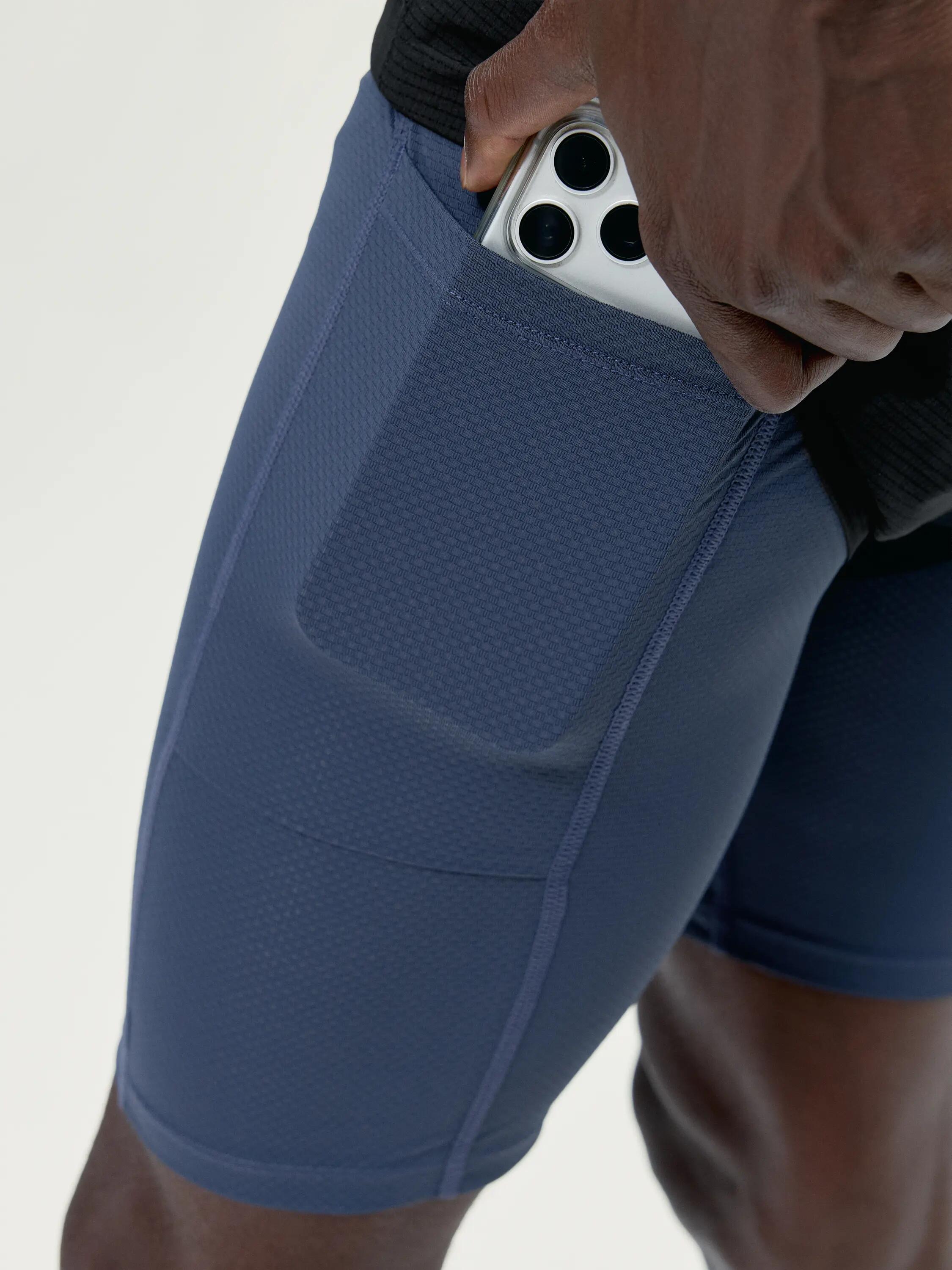 Pantalón corto deportivo de hombre Strider 2 en 1 con bolsillos 4/6