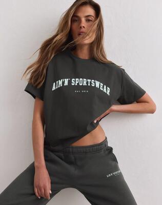 Dames t-shirt korte mouwen losvallend katoen varsity donker klimopgroen