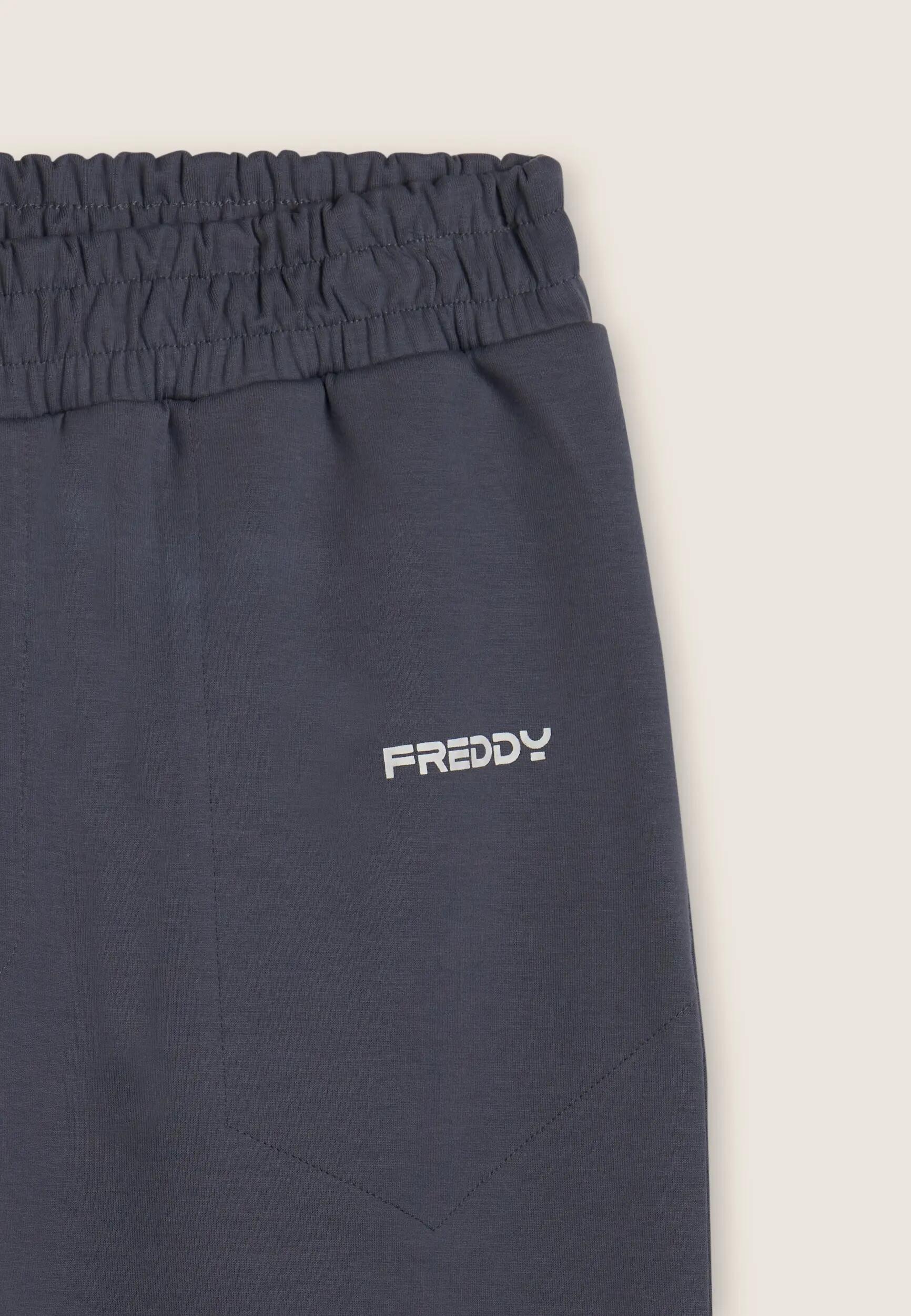 Pantalón slim interlock con detalles brillantes 6/6