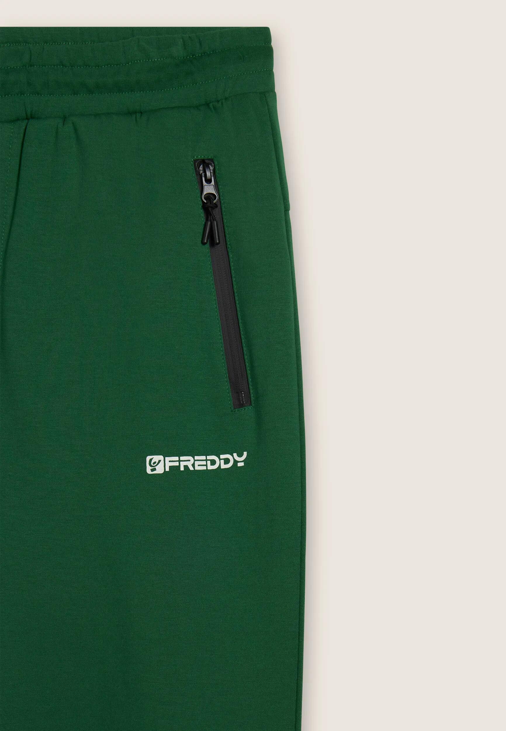 Pantaloni a carota in interlock con zip laterali 6/6