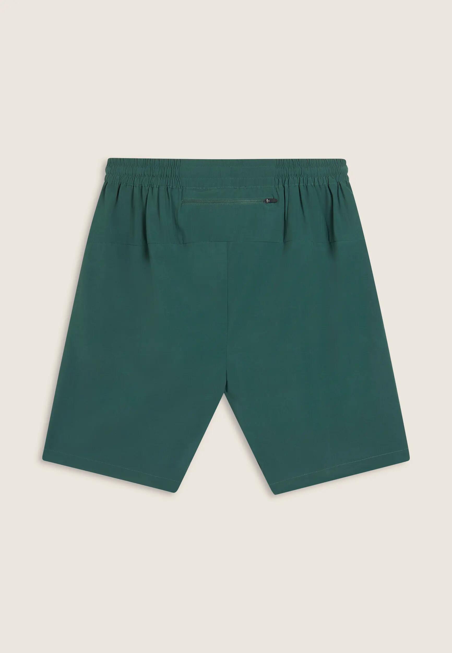 Pantalon court de coupe ajustée avec poches zippées et cordon à la taille 5/6