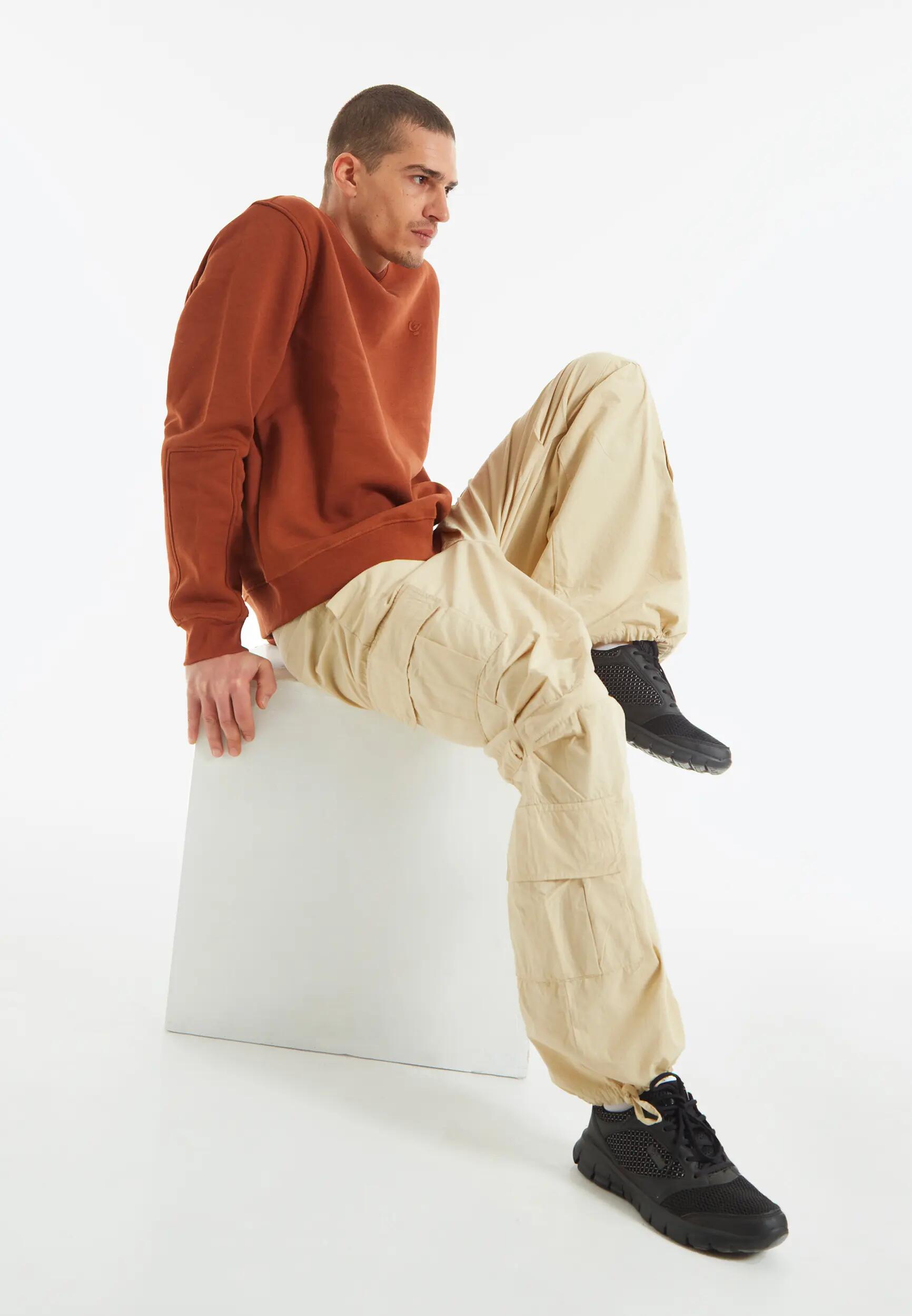 Pantalón cargo con bolsillos dobles y cordón de ajuste intermedio 7/9