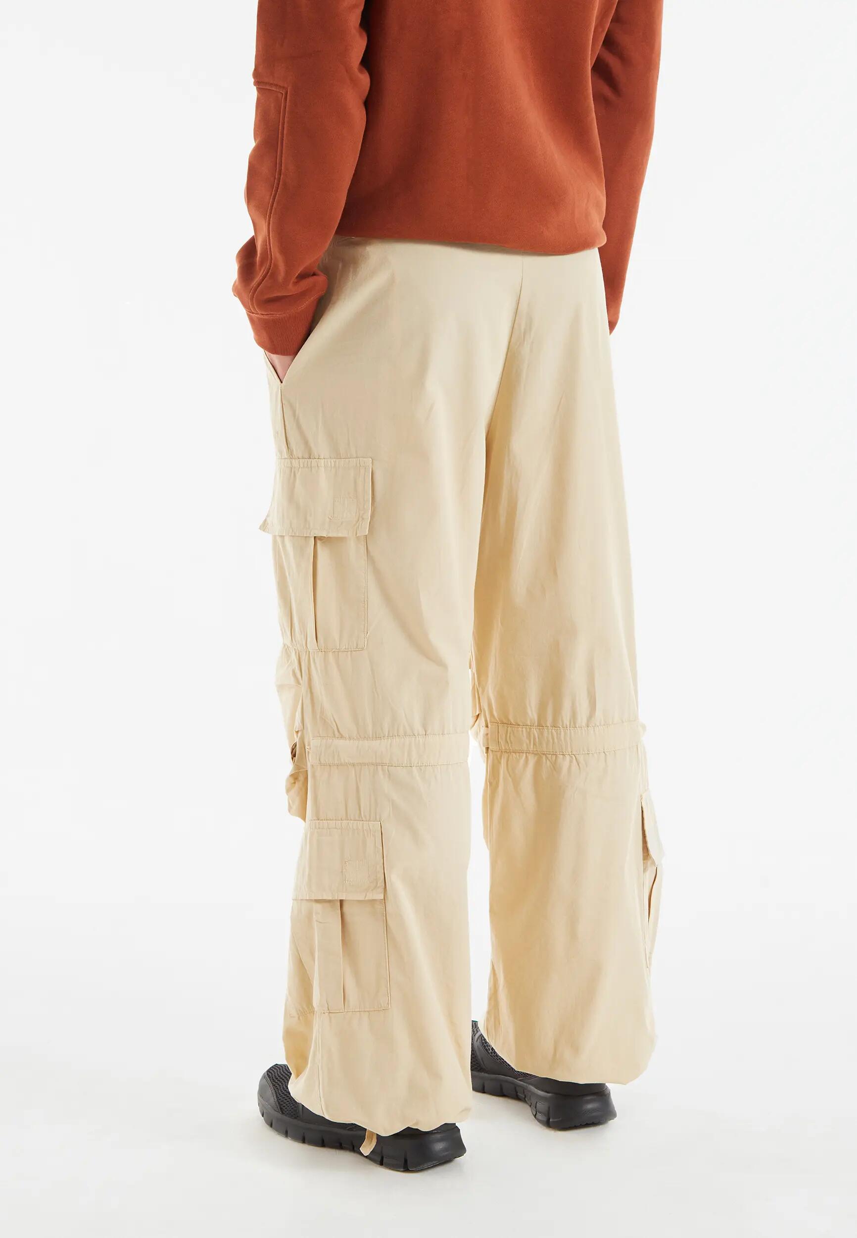 Pantalón cargo con bolsillos dobles y cordón de ajuste intermedio 6/9