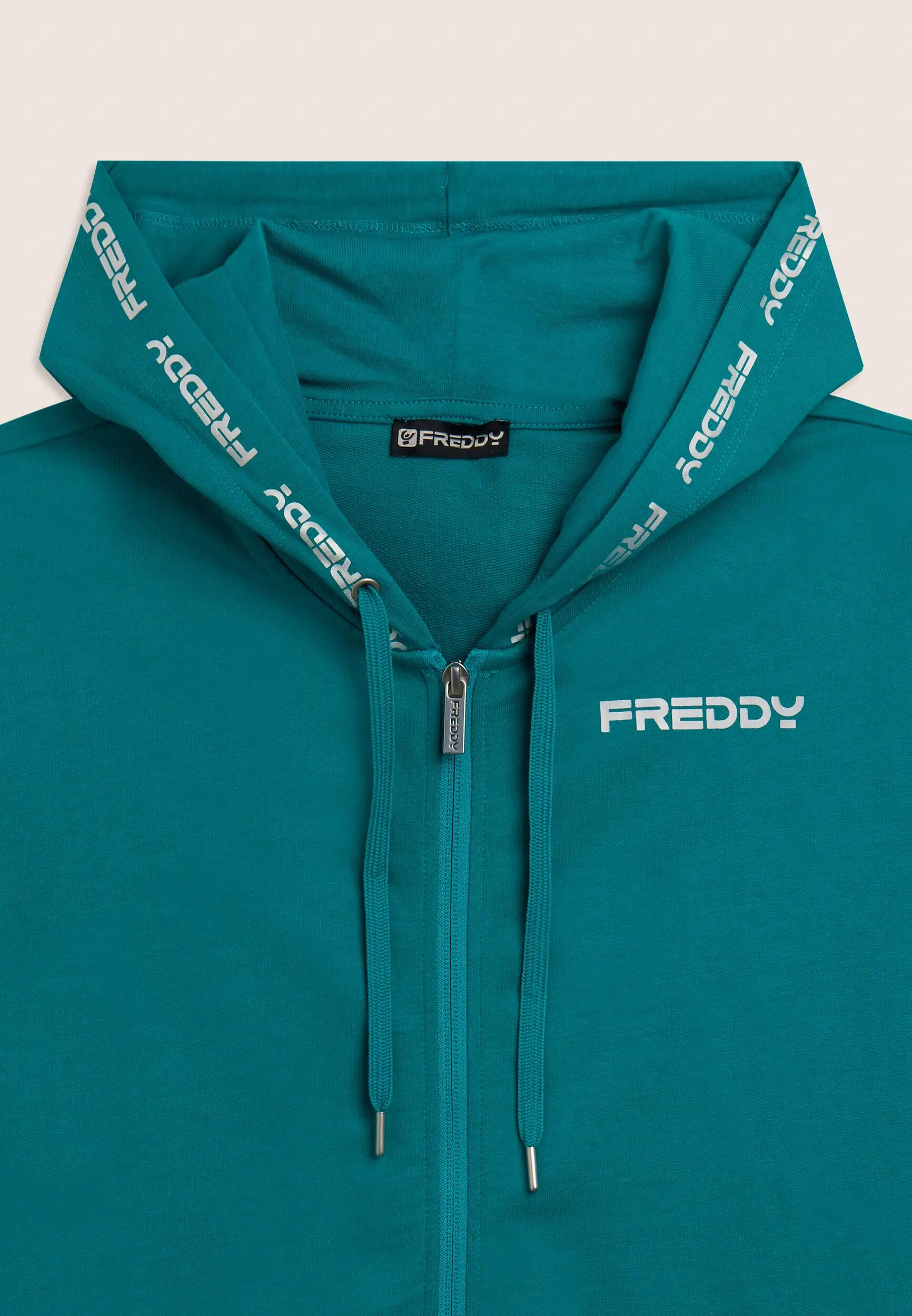 Tuta con zip e cappuccio, inserti a contrasto e dettagli logo 7/8