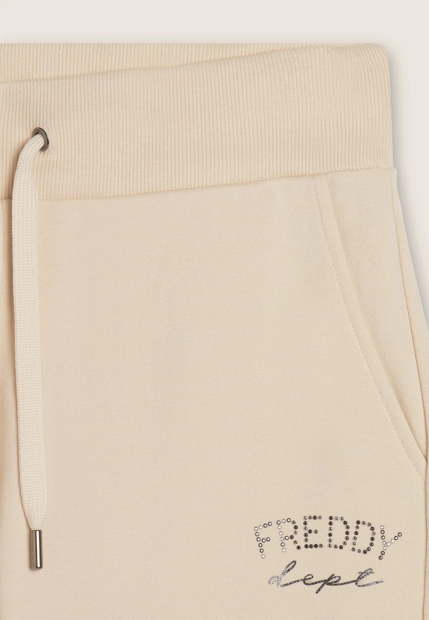 Pantalón deportivo con puños en los bajos y cordón 7/7