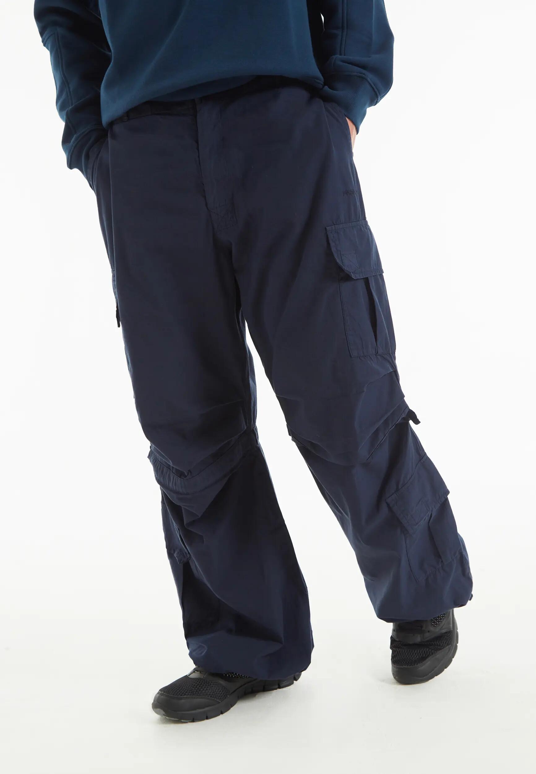 Pantalon cargo avec poches doubles et lacet ajustable intermédiaire 7/8