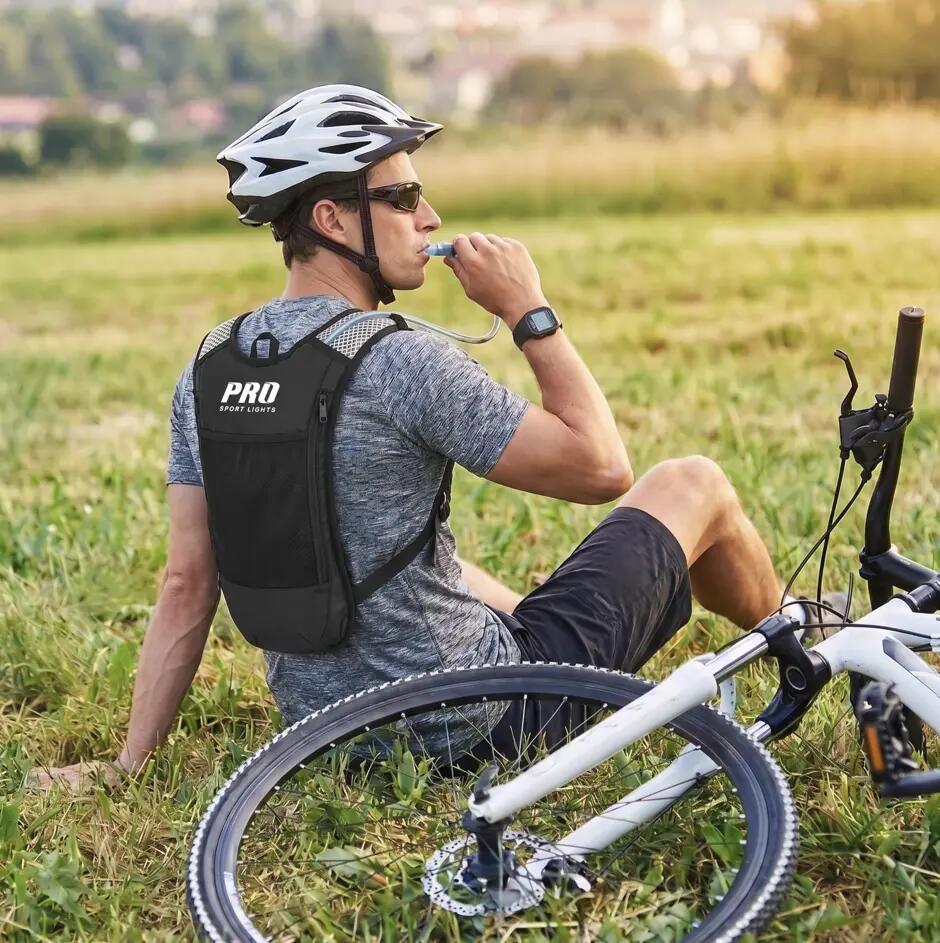 Mochila de hidratação para corrida com sistema de hidratação de 2 litros 4/11