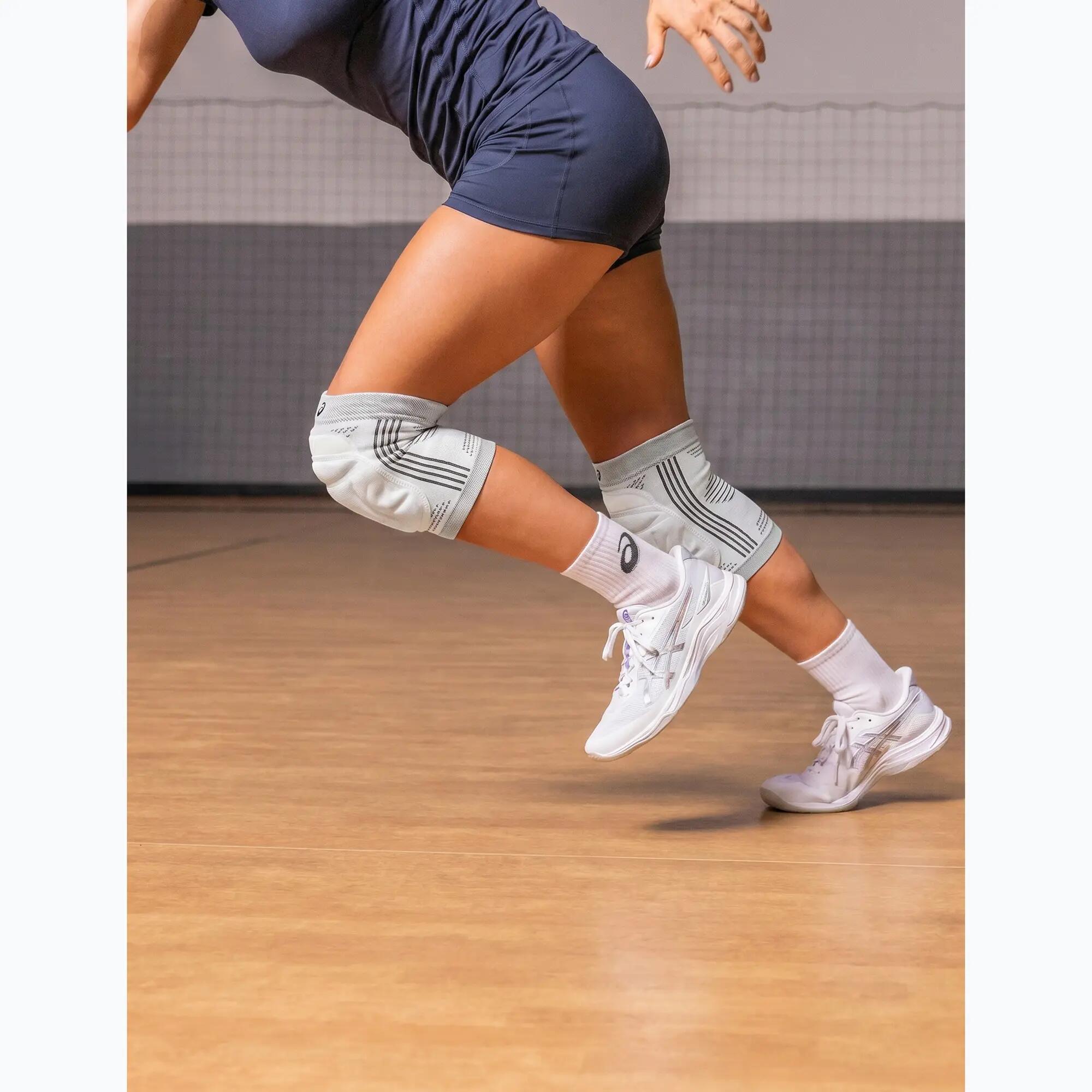 Prestaties kniebrace Asics 5/6