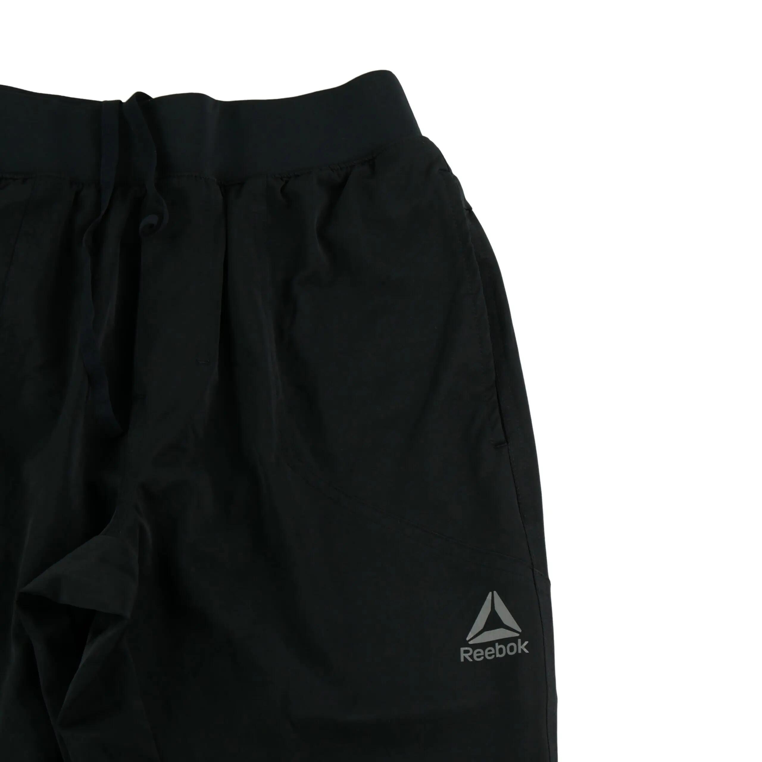 Spodnie dresowe damskie Reebok z kieszenią na zamek 3/5