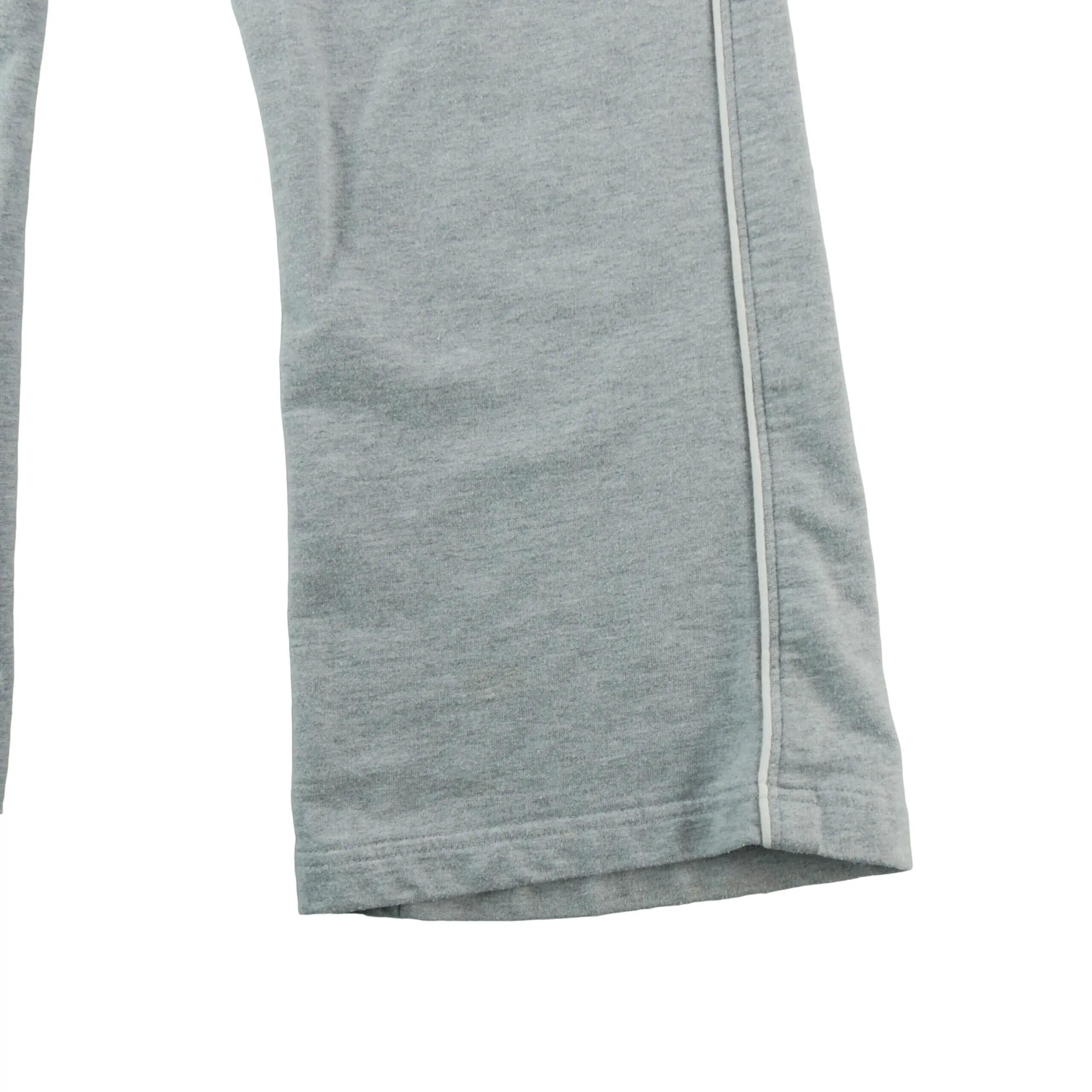 Tweedehands - Dames jogging met witte zijbies - Als nieuw 4/6
