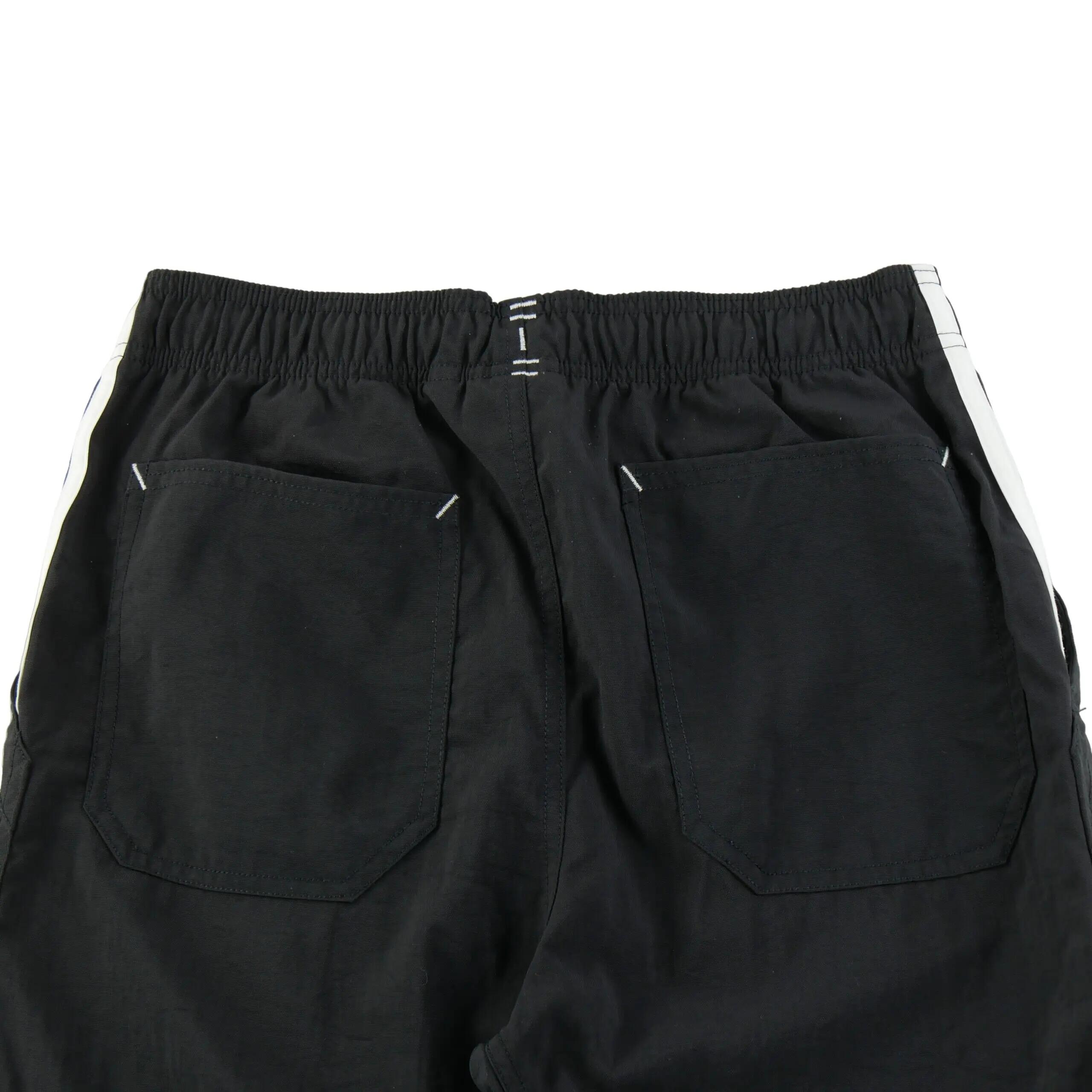 Seconde vie - Pantalon Homme Relaxed Tapered Fit Noir - Excellent 5/7