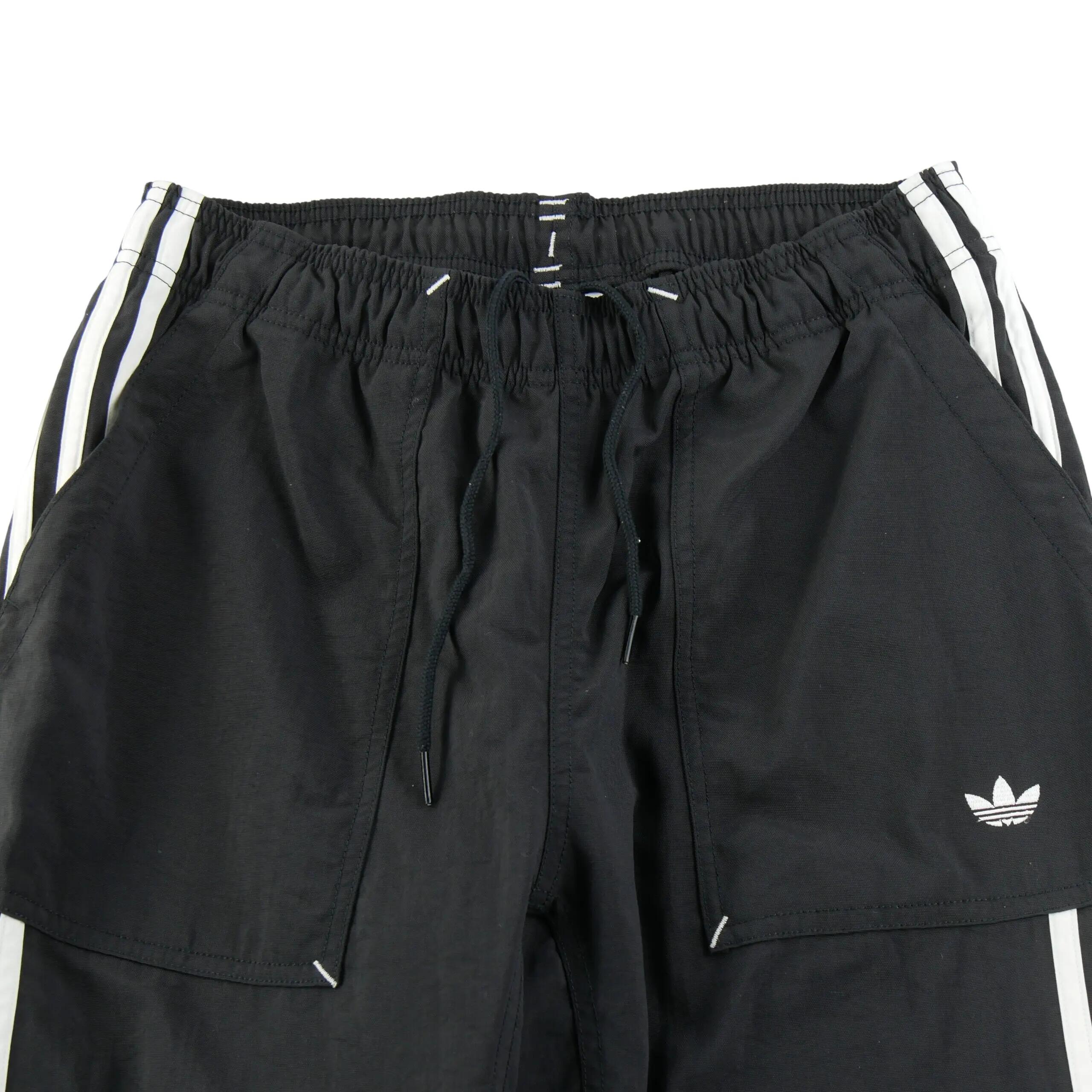 Seconde vie - Pantalon Homme Relaxed Tapered Fit Noir - Excellent 4/7