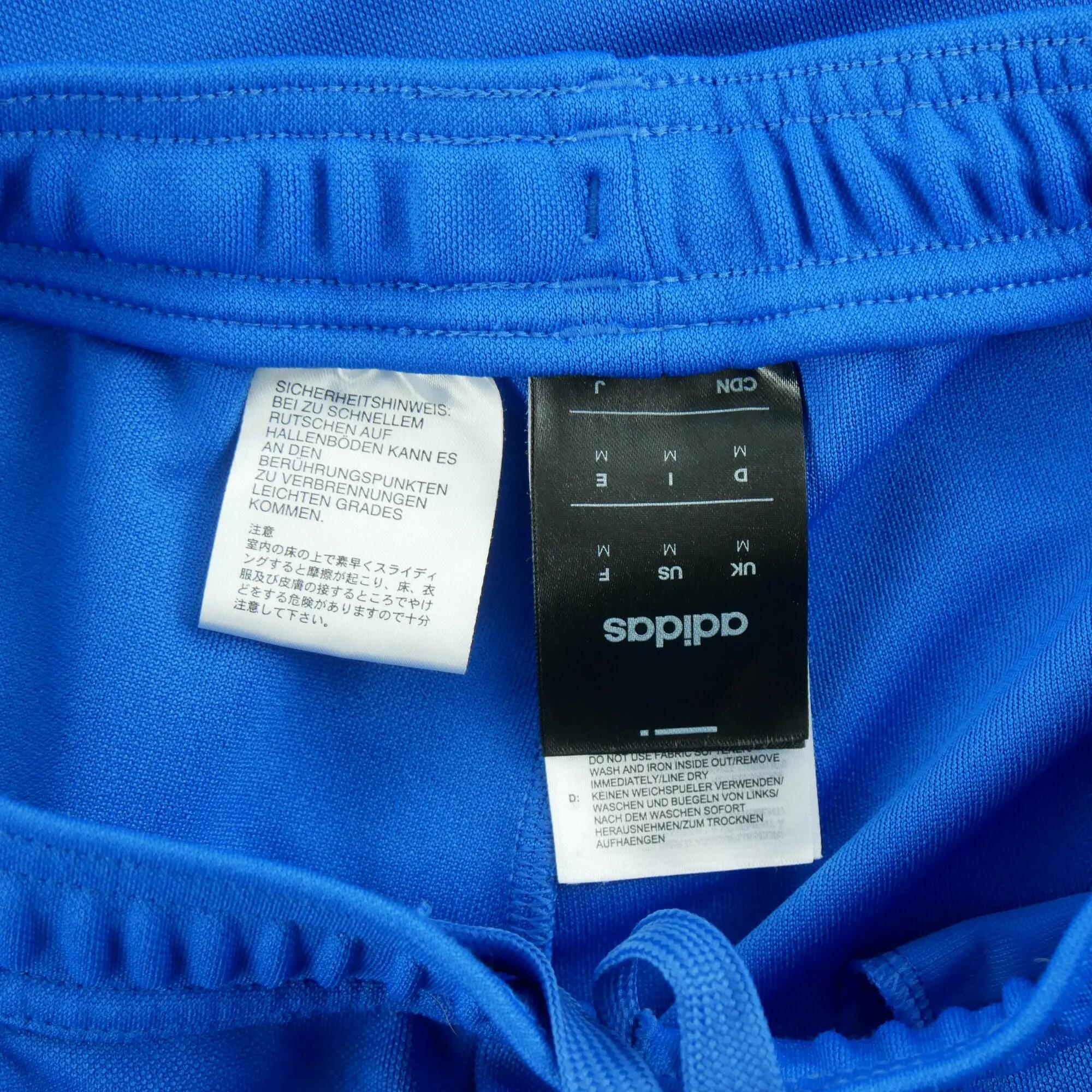 Tweedehands - Adidas joggingbroek Tiro tapered fit heren blauw - Als nieuw 9/10